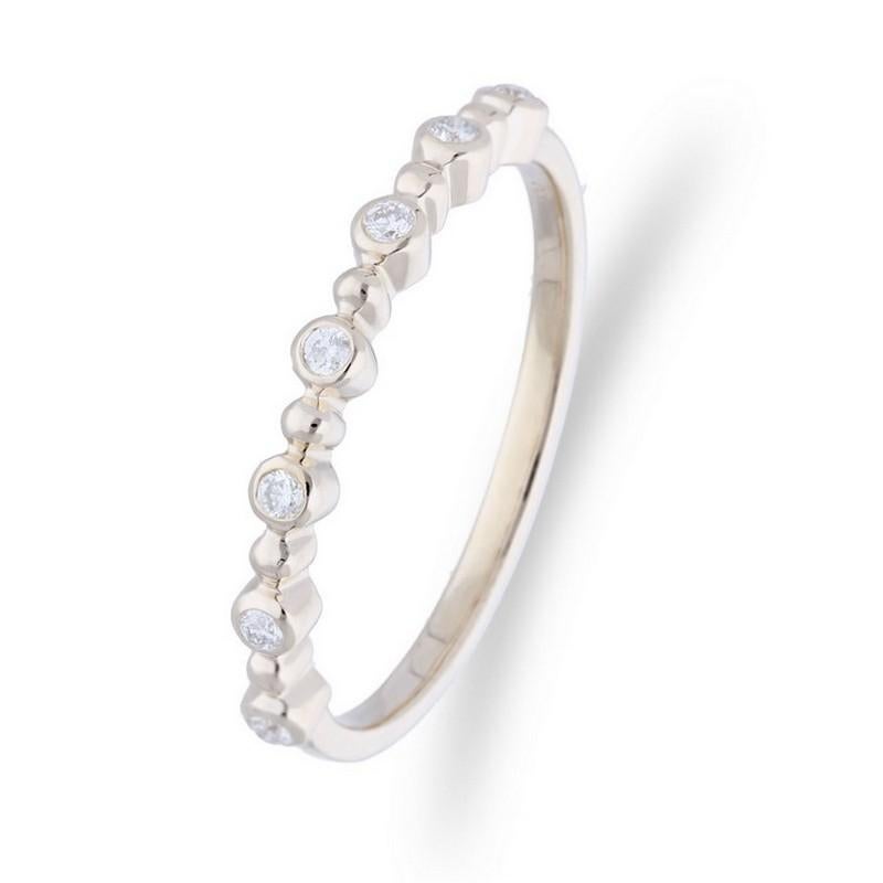 Diamond Carat Weight: This exquisite Gazebo Fancy Collection ring features a total of 0.09 carats of round diamonds set with precision in a bezel setting. The diamonds provide a subtle yet radiant shimmer to the ring.

Elegant Diamond Placement: The