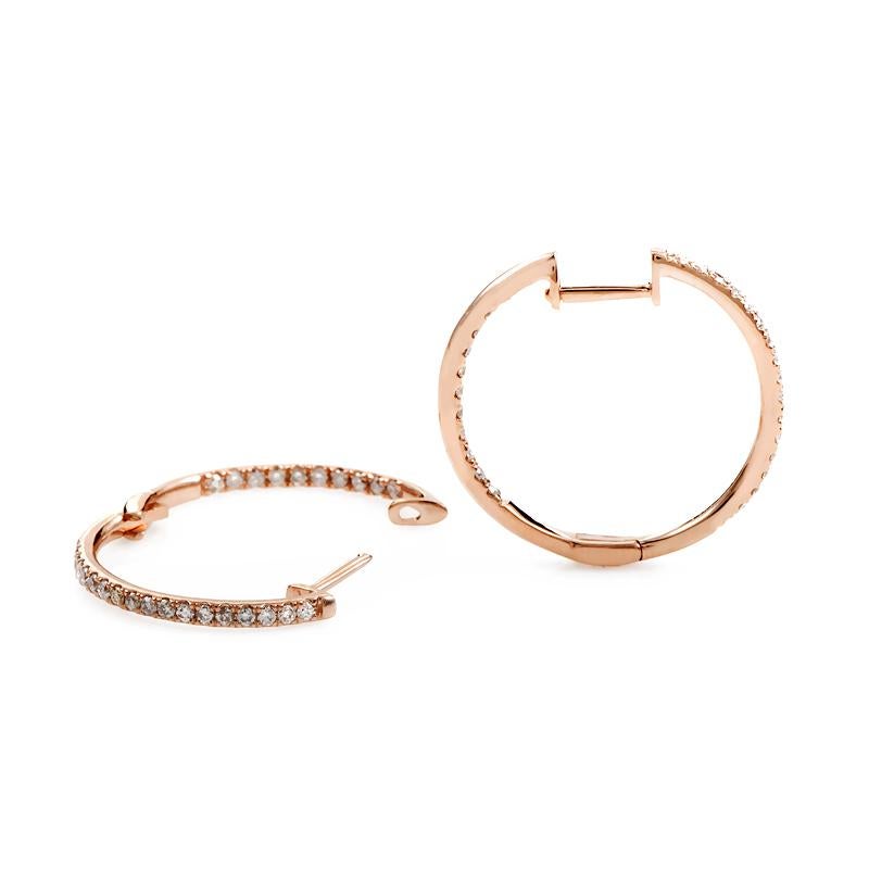 These exquisite hoop earrings are beautifully crafted from 14K rose gold and feature 0.51ct of brilliant-cut diamond stones, set on frontally visible sides both on the outside and the inside of the hoops.
