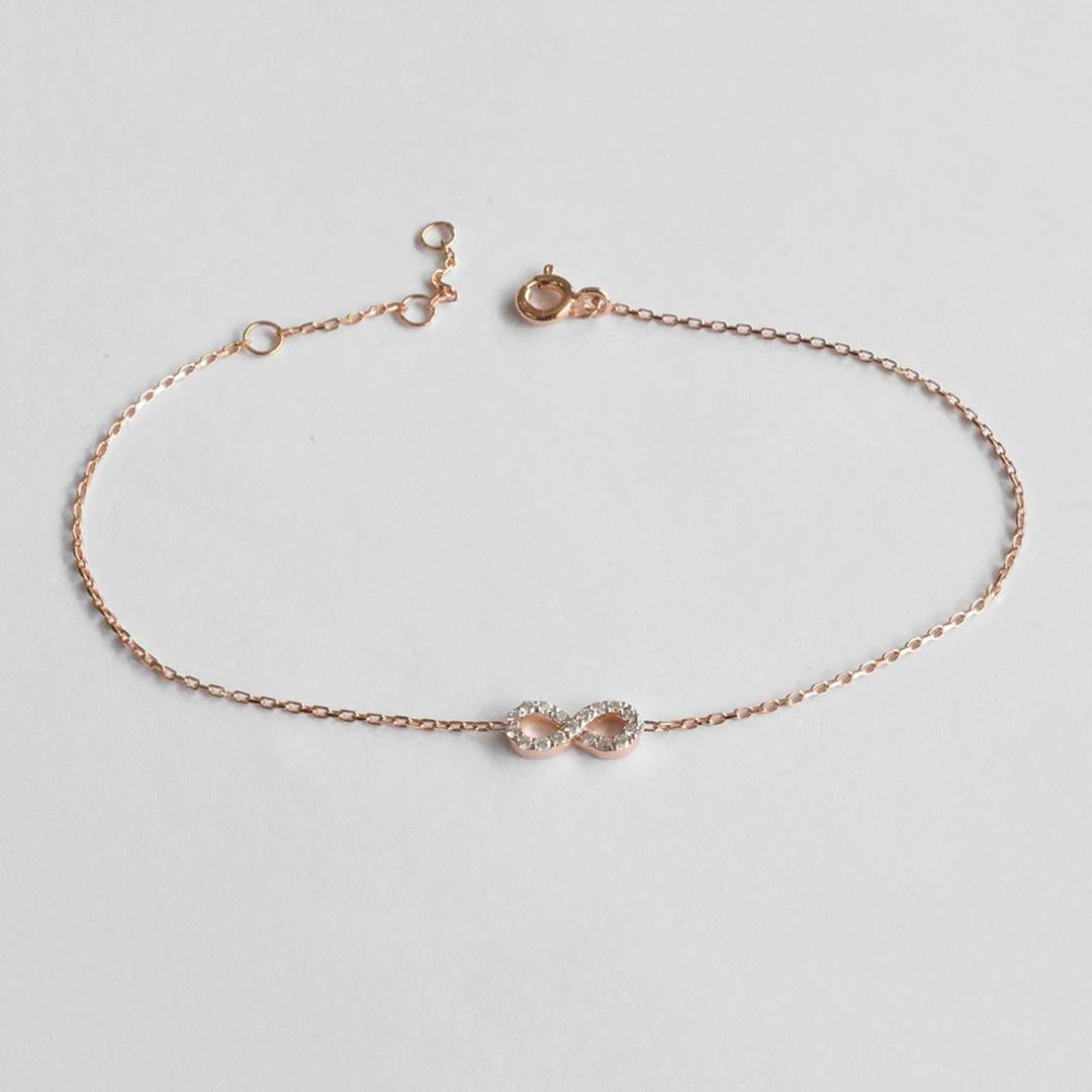 Diamond Infinity Knot Bracelet is made of 14k solid gold.
Available in three colors of gold: White Gold / Rose Gold / Yellow Gold.

Natural genuine round cut diamond each diamond is hand selected by me to ensure quality and set by a master setter in