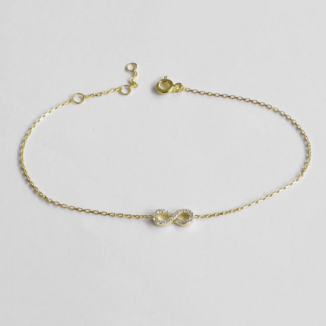 Round Cut 14k Gold Diamond Infinity Knot Bracelet Infinity Charm Bracelet For Sale
