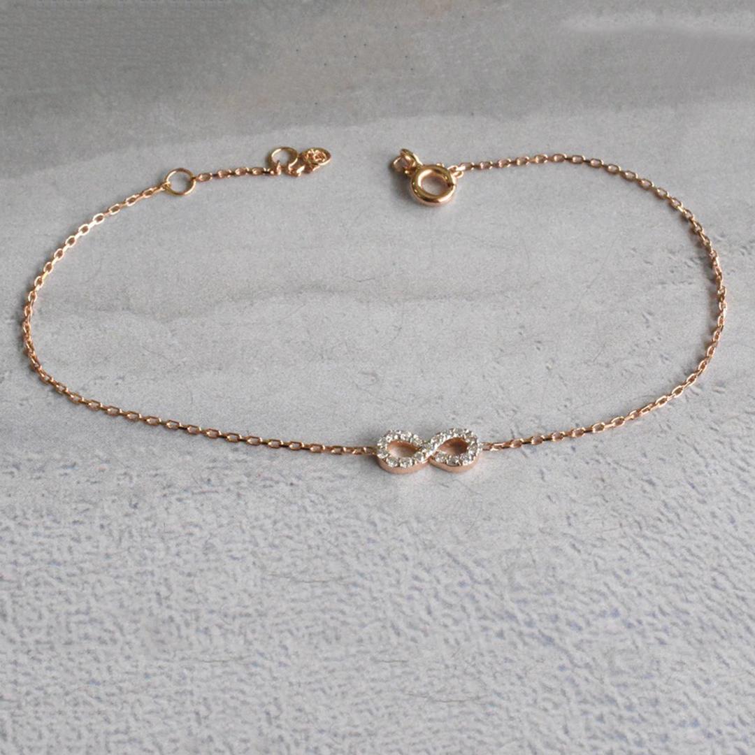 14k Gold Diamant Unendlichkeit Knoten-Armband Unendlichkeits-Charm im Zustand „Neu“ im Angebot in Bangkok, TH