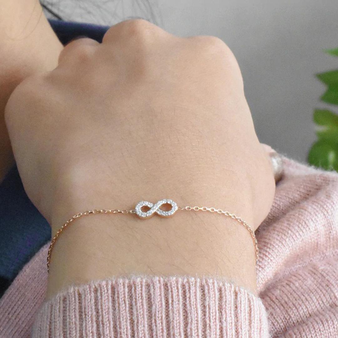 14k Gold Diamond Infinity Knot Bracelet Infinity Charm Bracelet For Sale 1