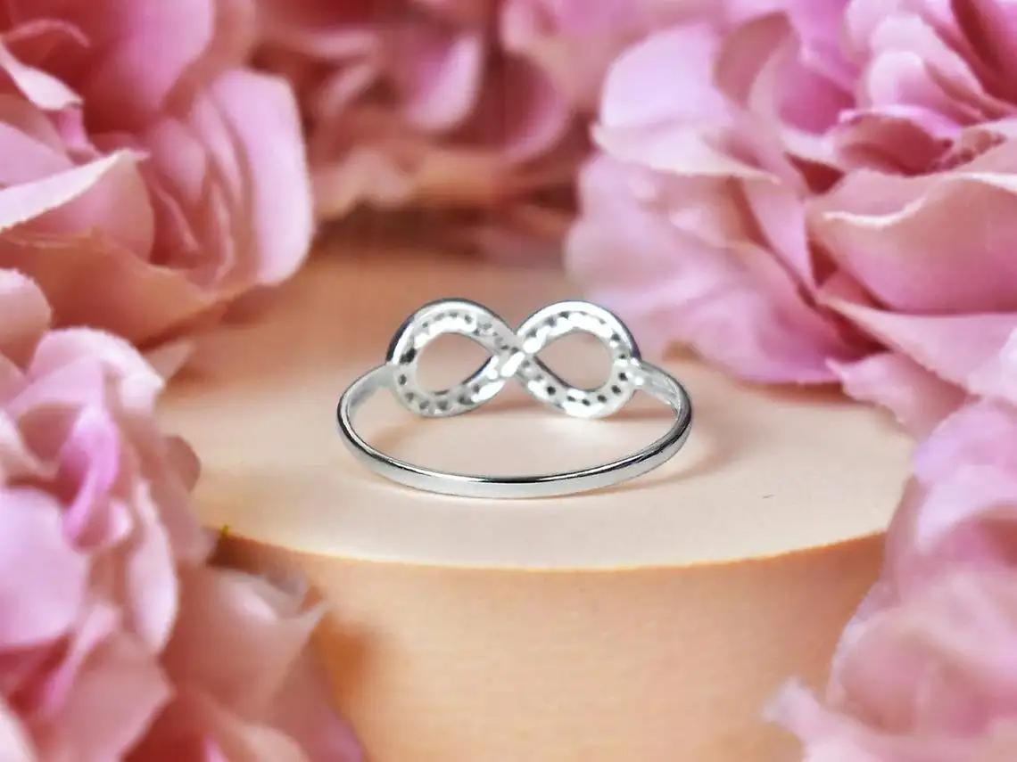 For Sale:  14k Gold Diamond Infinity Ring Love Knot Diamond Ring 6