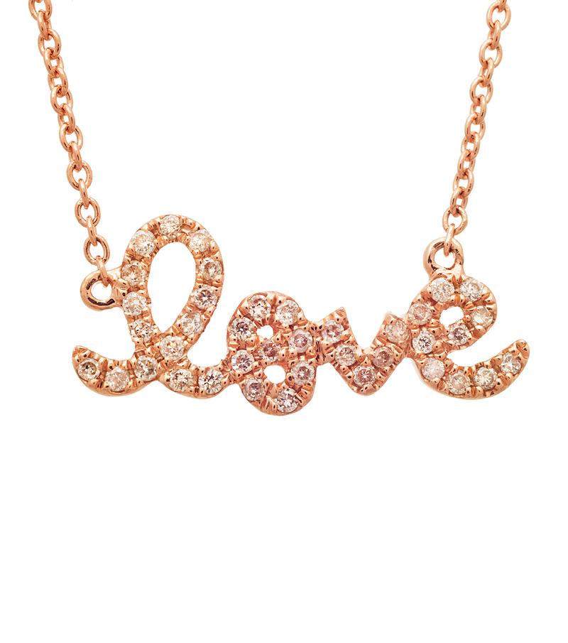 The Sydney Evan Small Gold and Diamond Love Necklace, a hit among celebrities, features the word 
