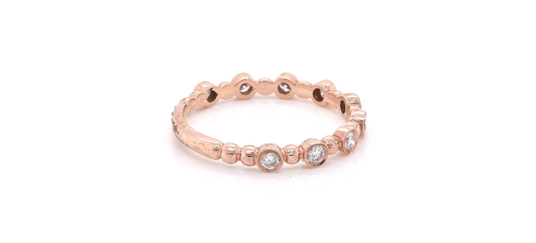 Material: 14k rose gold
Diamonds: 9 round brilliant cuts = 0.25cttw
Color: I
Clarity: SI1-SI2
Size: 5 ½ 
Dimensions: ring is 1.90mm in width
Weight: 1.29 grams
