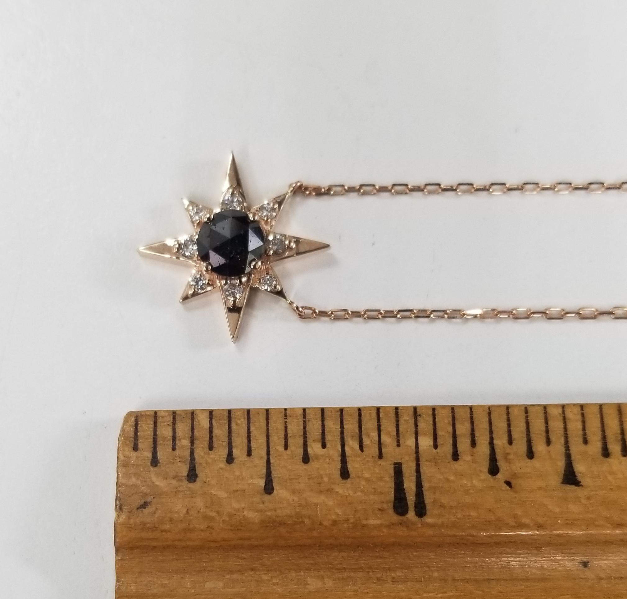 Contemporary 14 Karat Rose Gold Diamond Star Burst with Black and White Diamonds For Sale
