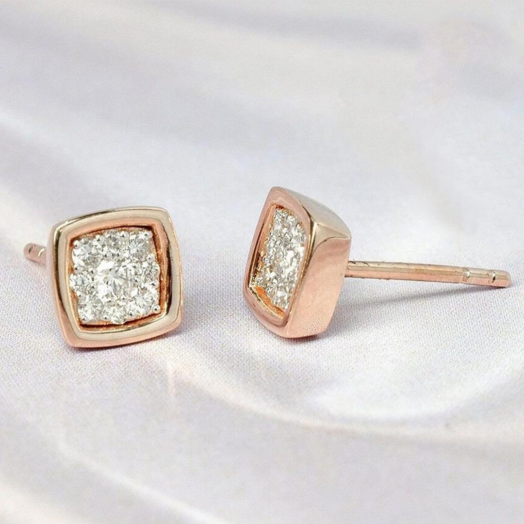 Diamond Stud Earrings are made of 14k solid gold available in three colors of gold, Rose Gold / White Gold / Yellow Gold.

Earrings adorn with white sparkly genuine diamonds. Simple modern and unique diamond stud earrings perfect for wedding,