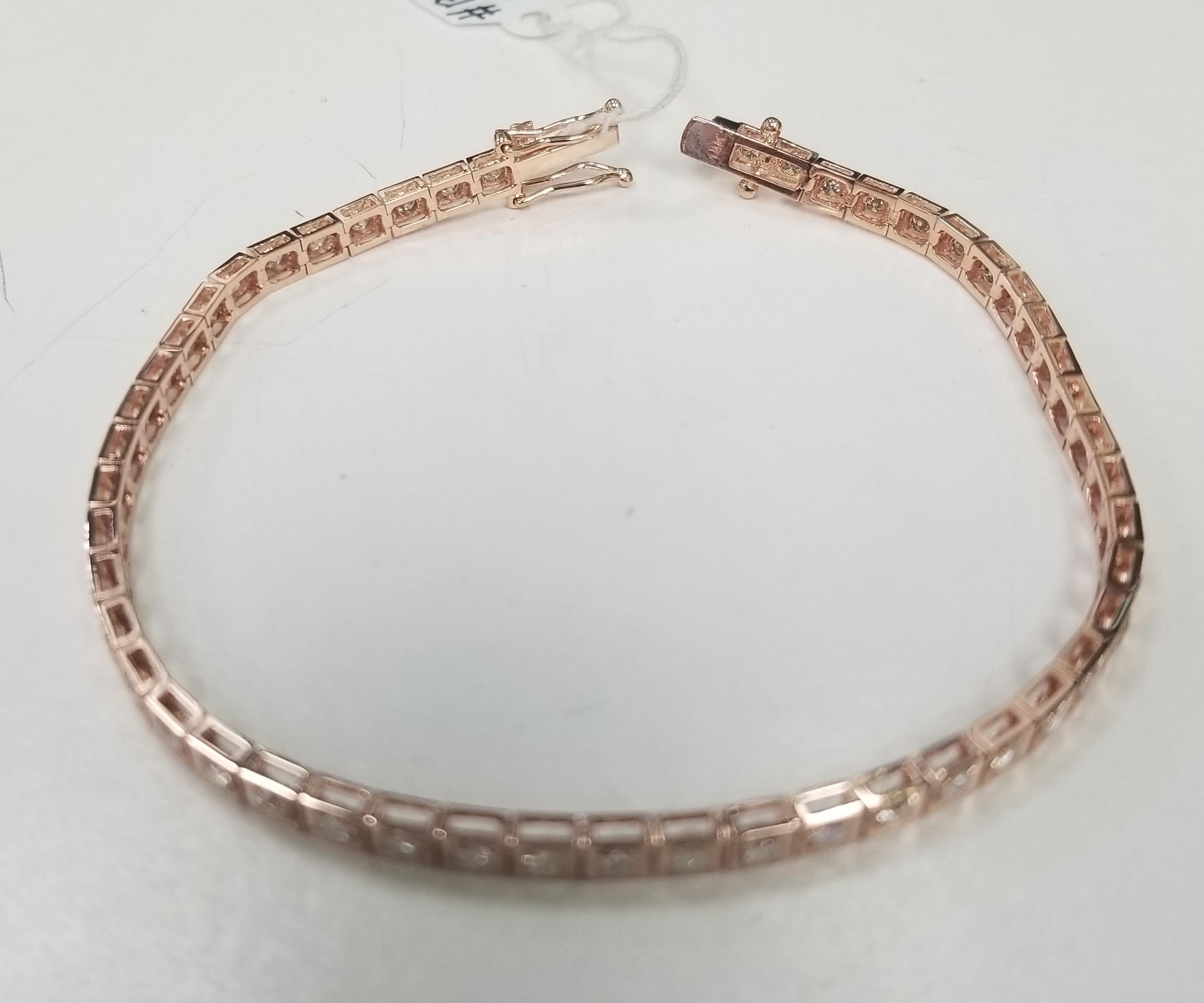 Specifications:
    main stone:ROUND DIAMONDS
    diamonds: 49PCS
    carat total weight:approximately 2.30 CTW
    color: G-H
    clarity: VS2-SI1
    brand:CUSTOM MADE
    metal:14K rose gold
    type:BRACELET
    weight: 7.8 gr
    length:7.25