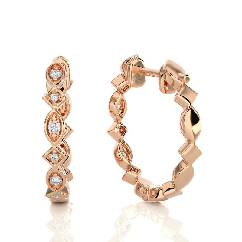 Elevate your style with our 14K Rose Gold Diamonds Huggie Earring, featuring a delicate 0.13 CTW of brilliant diamonds. Crafted in the warm embrace of rose gold, this earring exudes timeless charm and modern sophistication. Its huggie design ensures