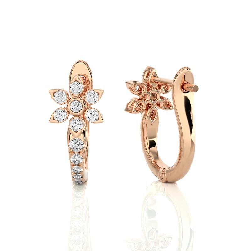 14K Rose Gold Diamonds Huggie Earring -0.35 CTW
A stellar fusion of elegance and allure. This exquisite huggie earring, crafted in romantic rose gold, showcases a singular star-shaped diamond that shimmers with a total carat weight of 0.35 Ct. Each