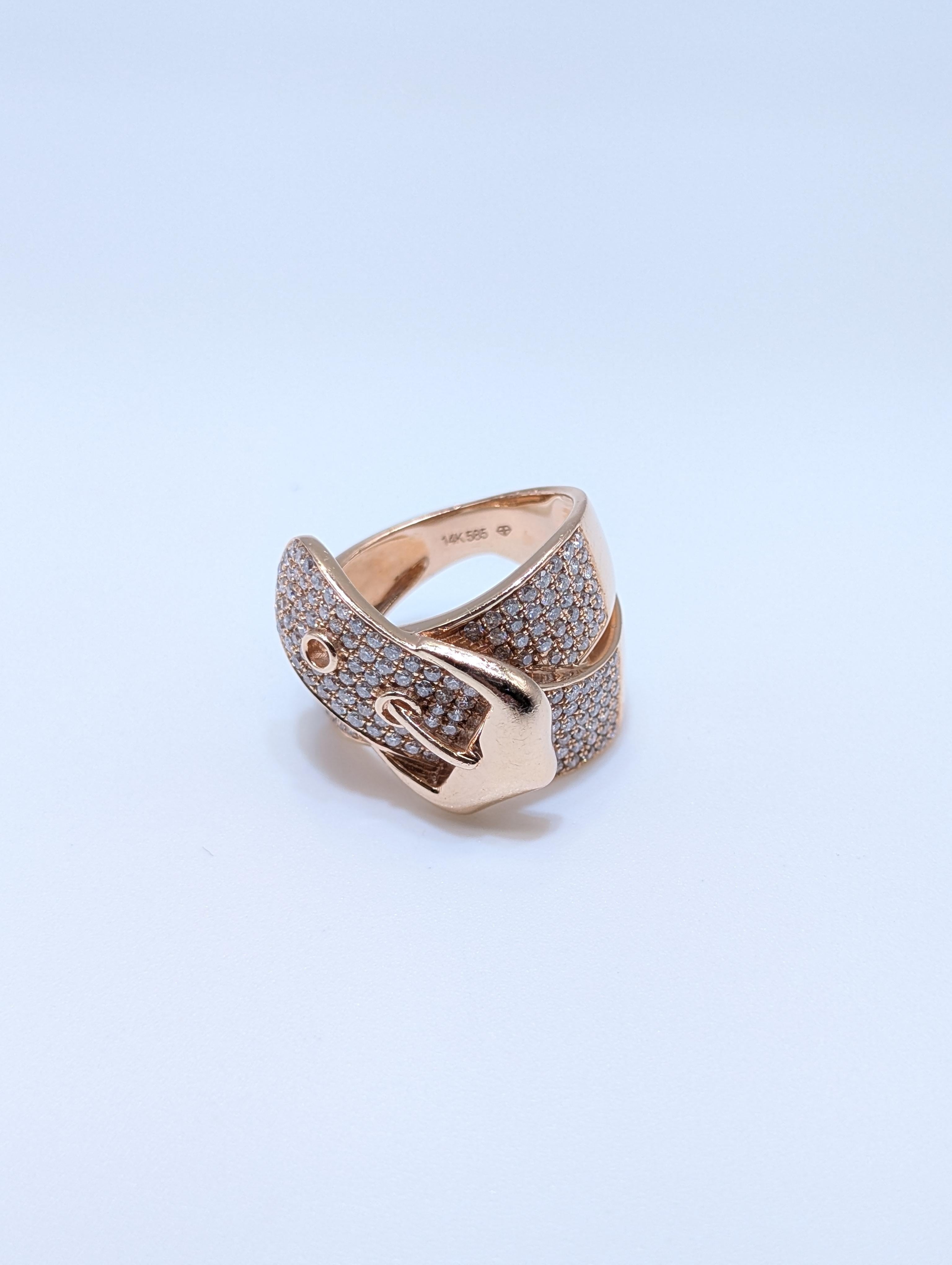 A chic and fashionable statement piece, this ring is crafted in 14k rose gold and styled in the shape of a belt and buckle. Its unique wrap-around design is fully accented with pavé-set diamonds, totaling 1.42 carats, delivering brilliance and charm