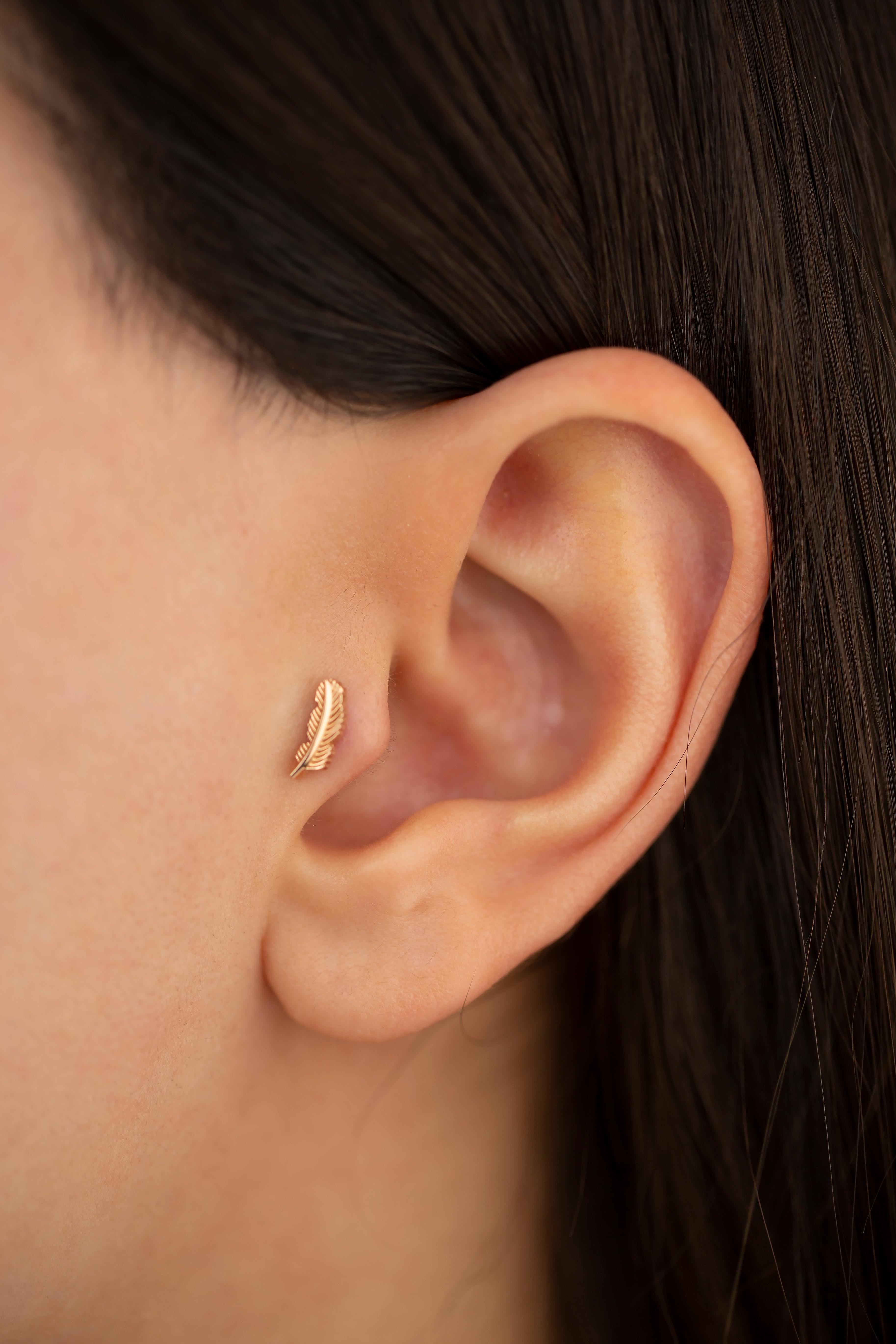 14K Rose Gold Feder Piercing, Feder Form Gold Ohrstecker

Sie können das Piercing auch als Ohrring verwenden! Auch dieses Piercing ist geeignet für Tragus, Nase, Helix, Lappen, flach, Medusa, Monreo, Labret und Stud.

Dieses Piercing wurde mit