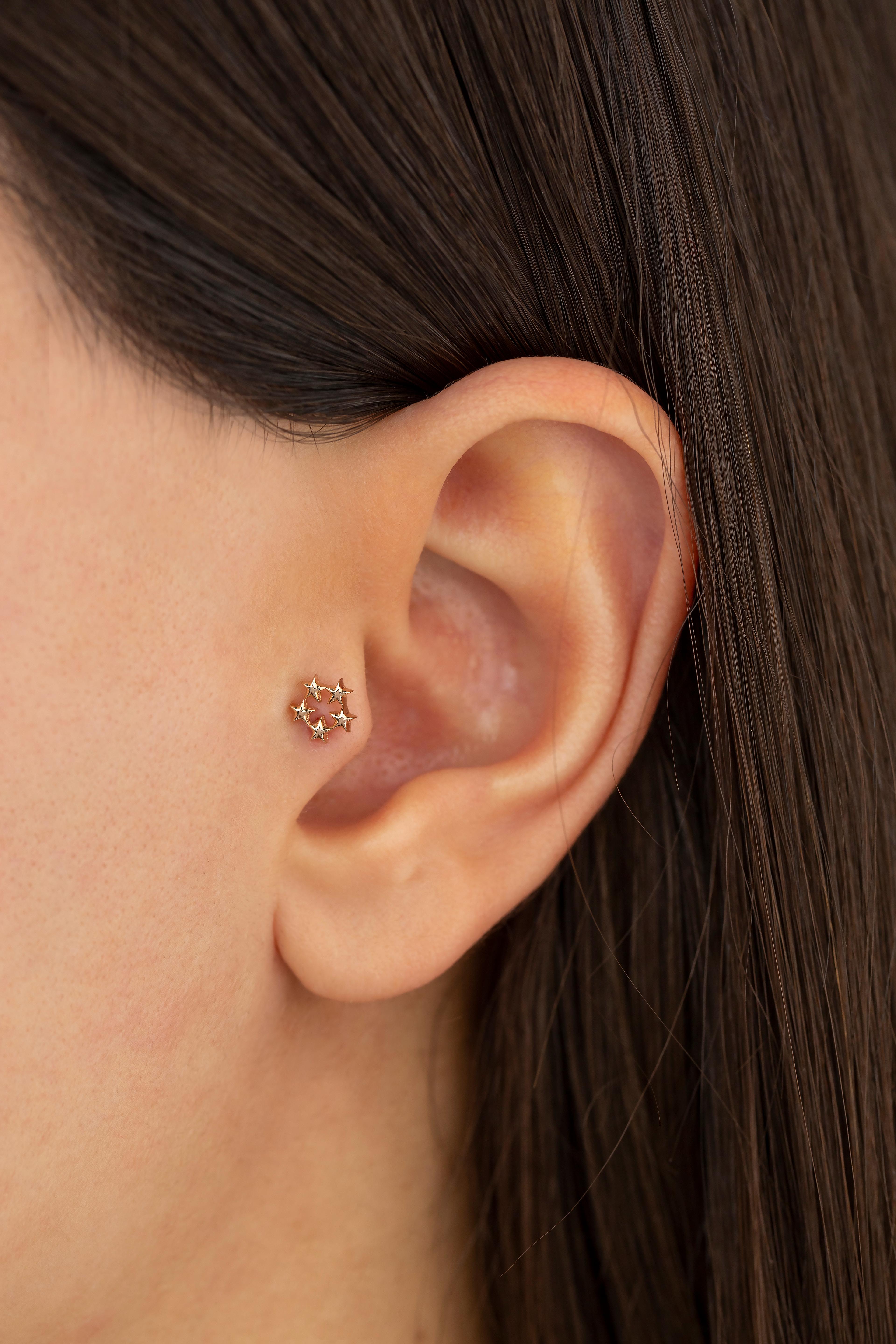 14K Rose Gold Five Stars Piercing, Stars Gold Stud Earring

You can use the piercing as an earring too! Also this piercing is suitable for tragus, nose, helix, lobe, flat, medusa, monreo, labret and stud.

This piercing was made with quality