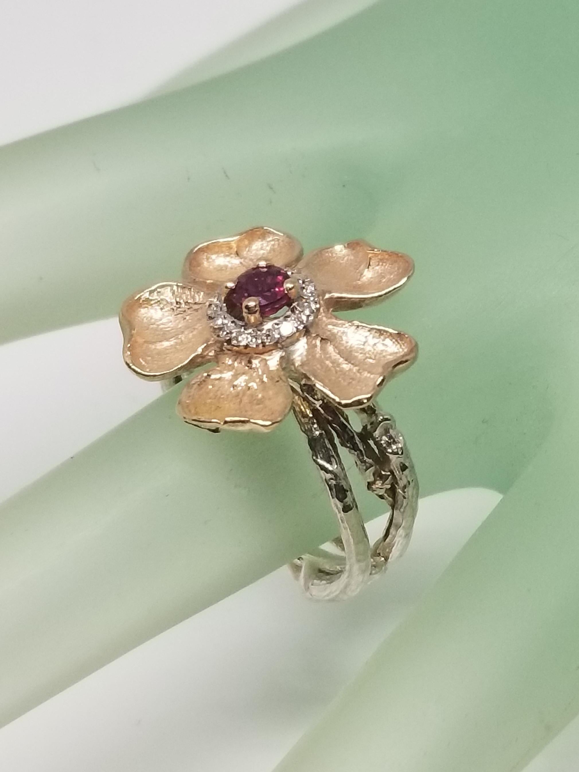 Round Cut 14 Karat Rose Gold Flower with a Ruby and Diamond Halo