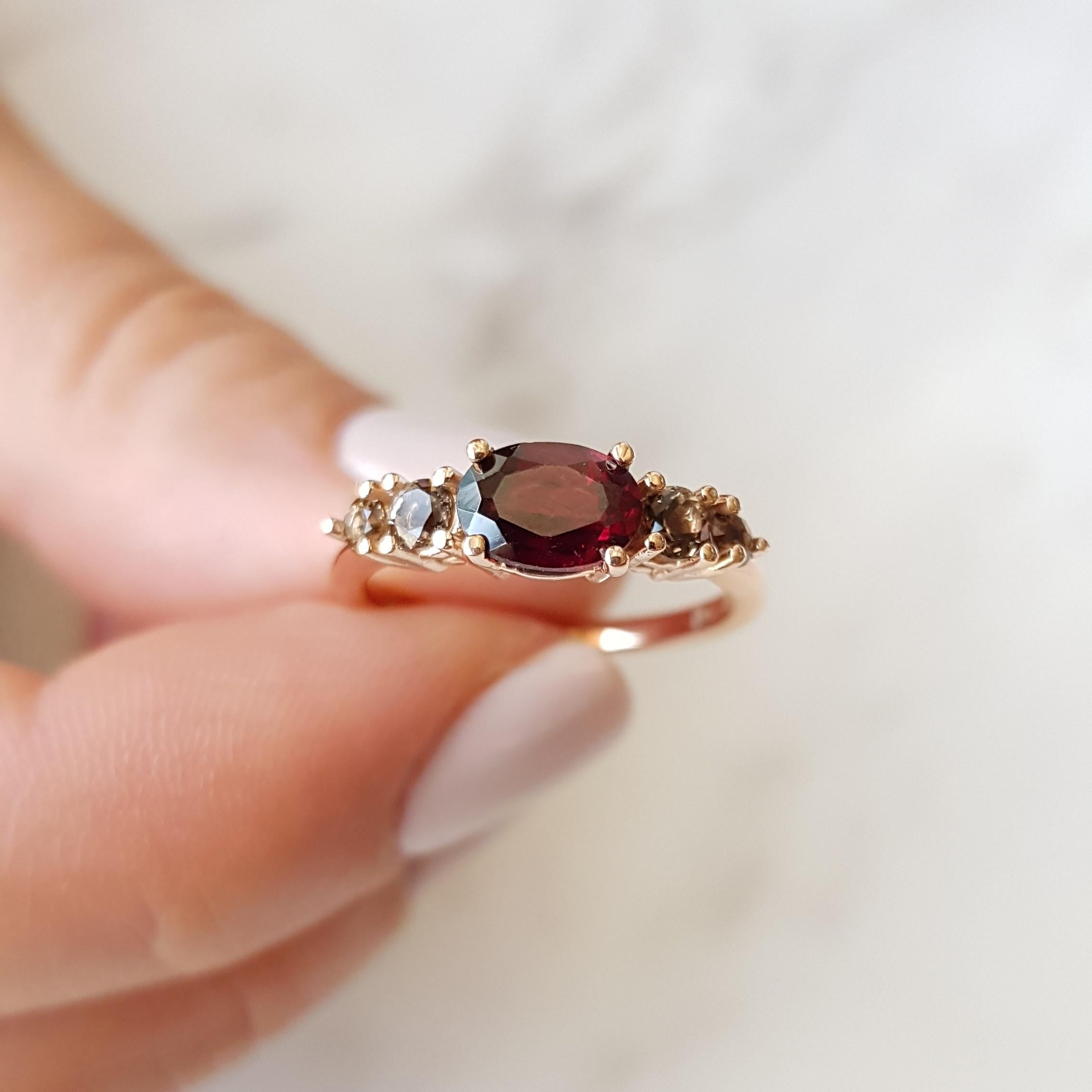 Old Rose Ring 

MADE TO ORDER *Please note that we take 30 business days to create your jewel before its ready to ship.  

A 14K rose gold ring perfectly combined by a Garnet and Smoky Quartz. Our main inspiration for the Old Rose Ring where roses
