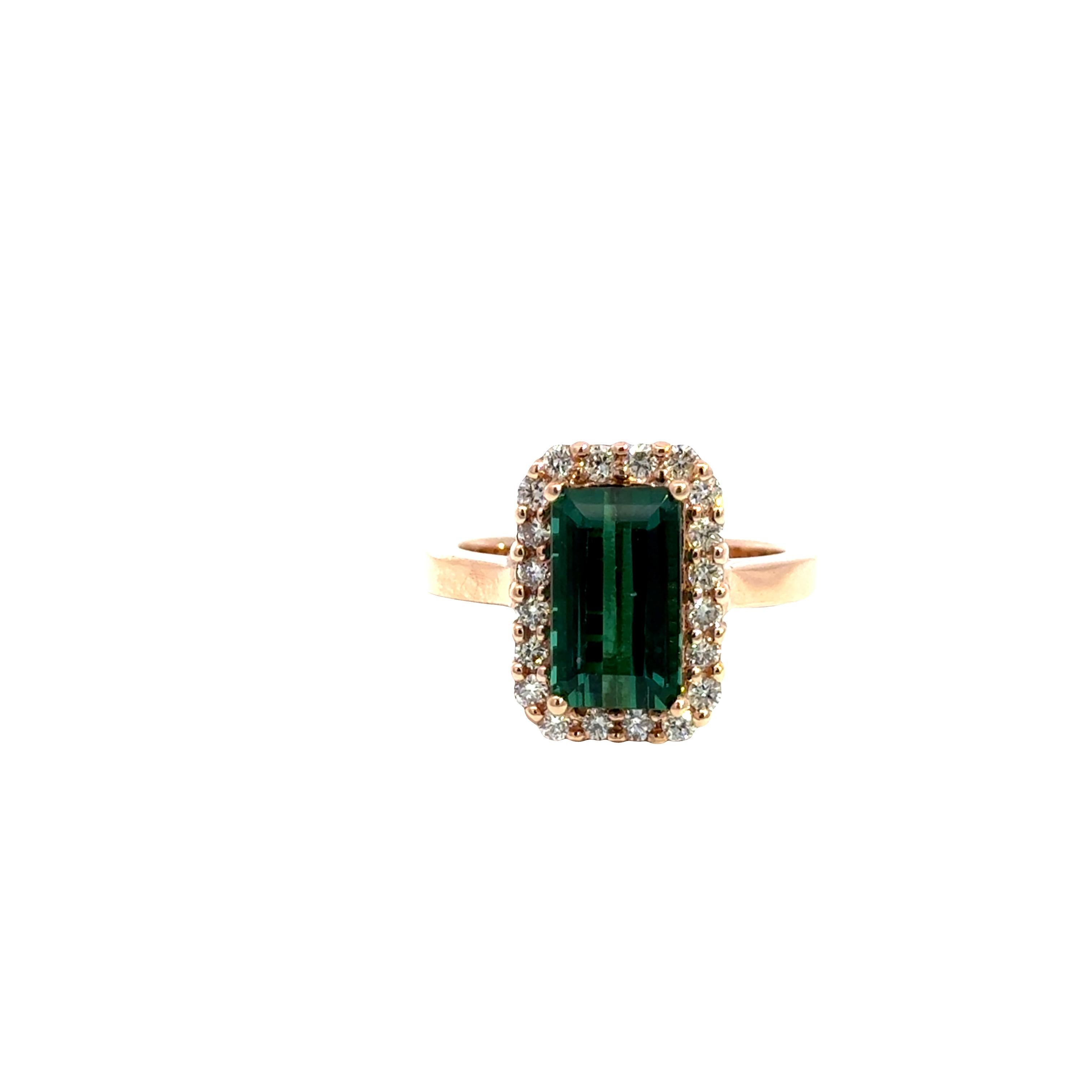 This elegant 14k rose gold ring features a stunning 3.01 ct rectangular-cut green tourmaline, radiating rich, vibrant color. Encircling the center stone is a halo of round brilliant diamonds totaling 0.53 ct, adding sparkle and refinement to the