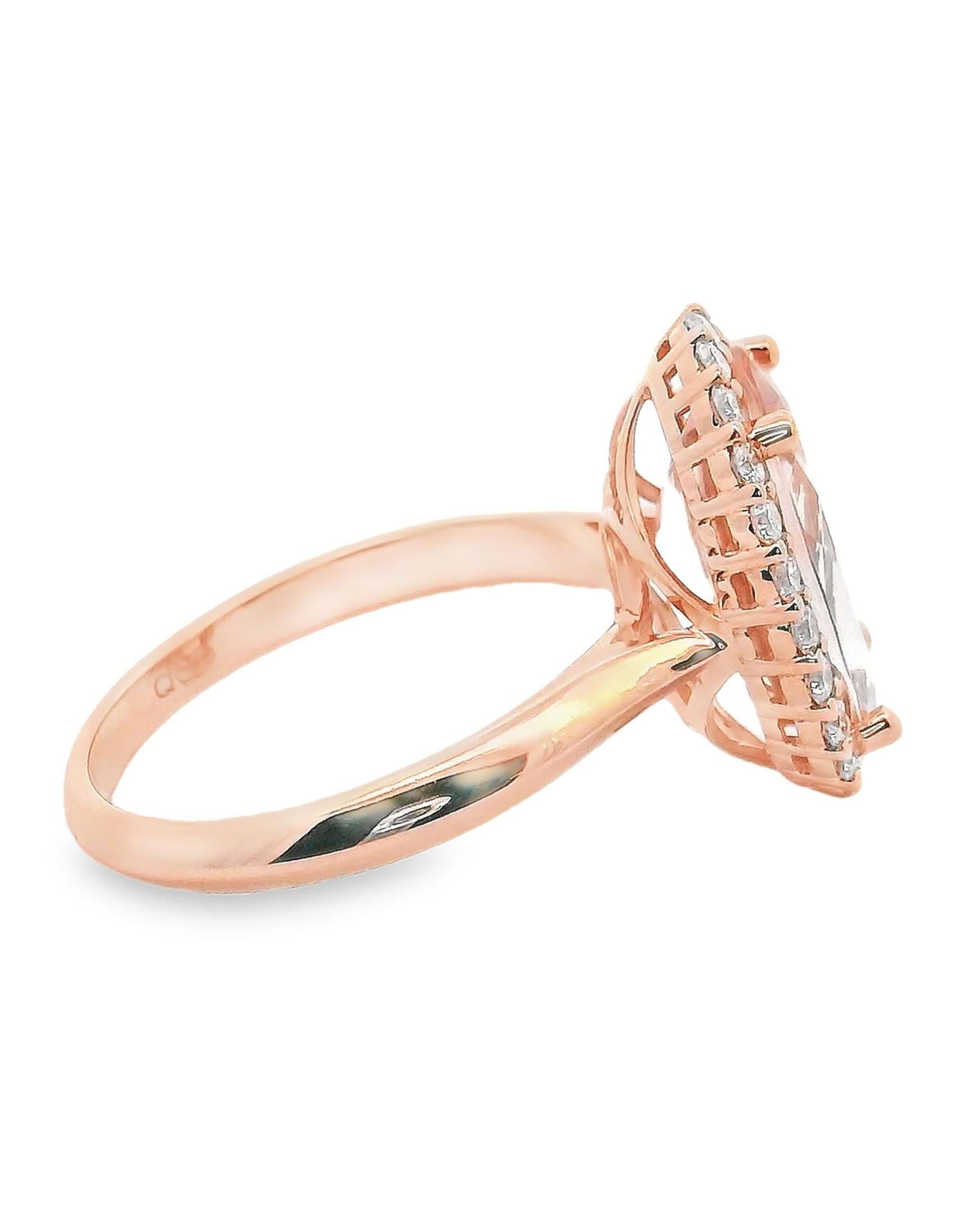 14K rose gold ring with round faceted diamonds weighing 0.44 carat total and one center oval shape morganite weighing 4.74 carats. 

- Finger size 6.5 (can be sized)
- Diamonds are H/I color, SI clarity.