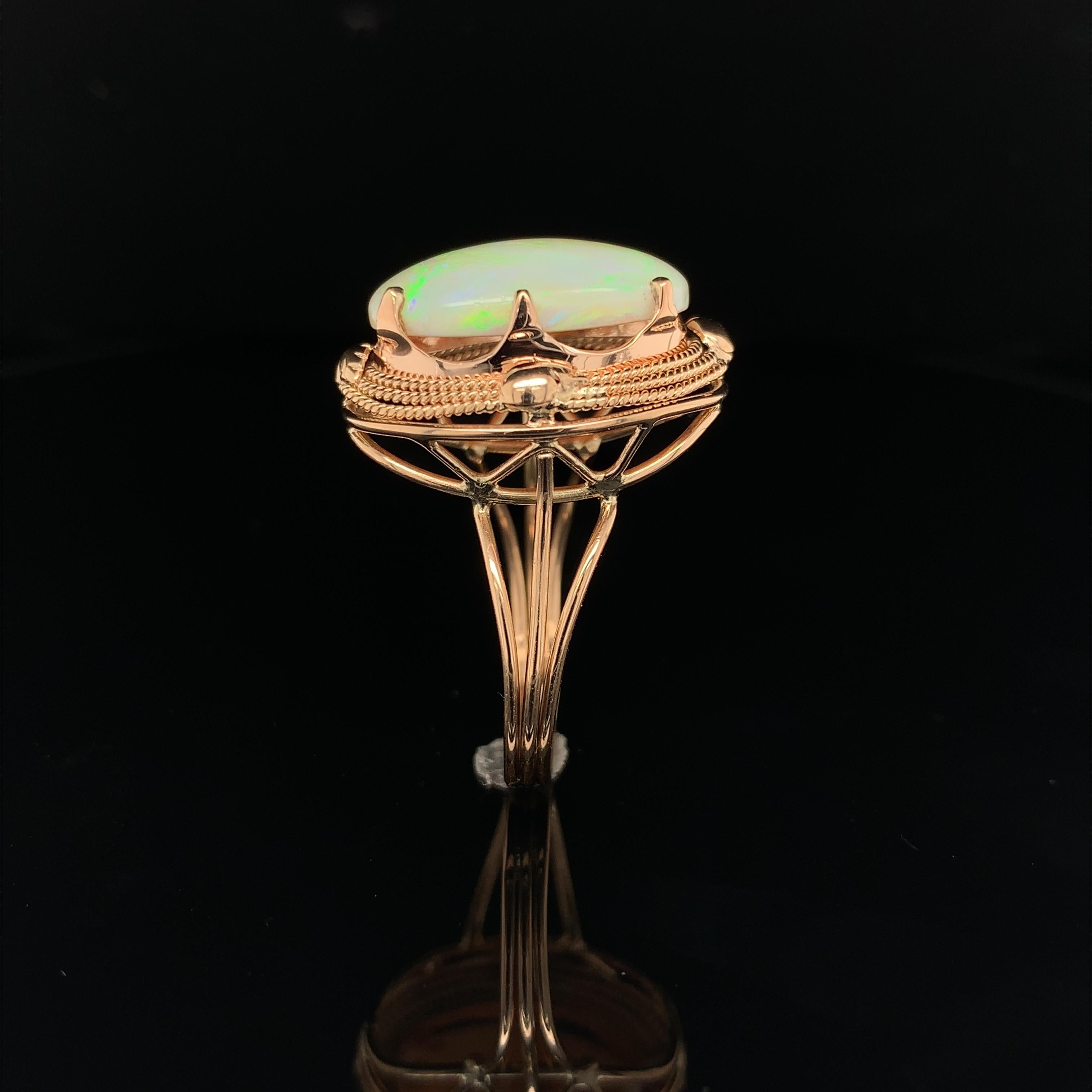 14K Rose Gold Hand Wrought Ring with a large 6.05 carat Australian Opal In Good Condition For Sale In Big Bend, WI