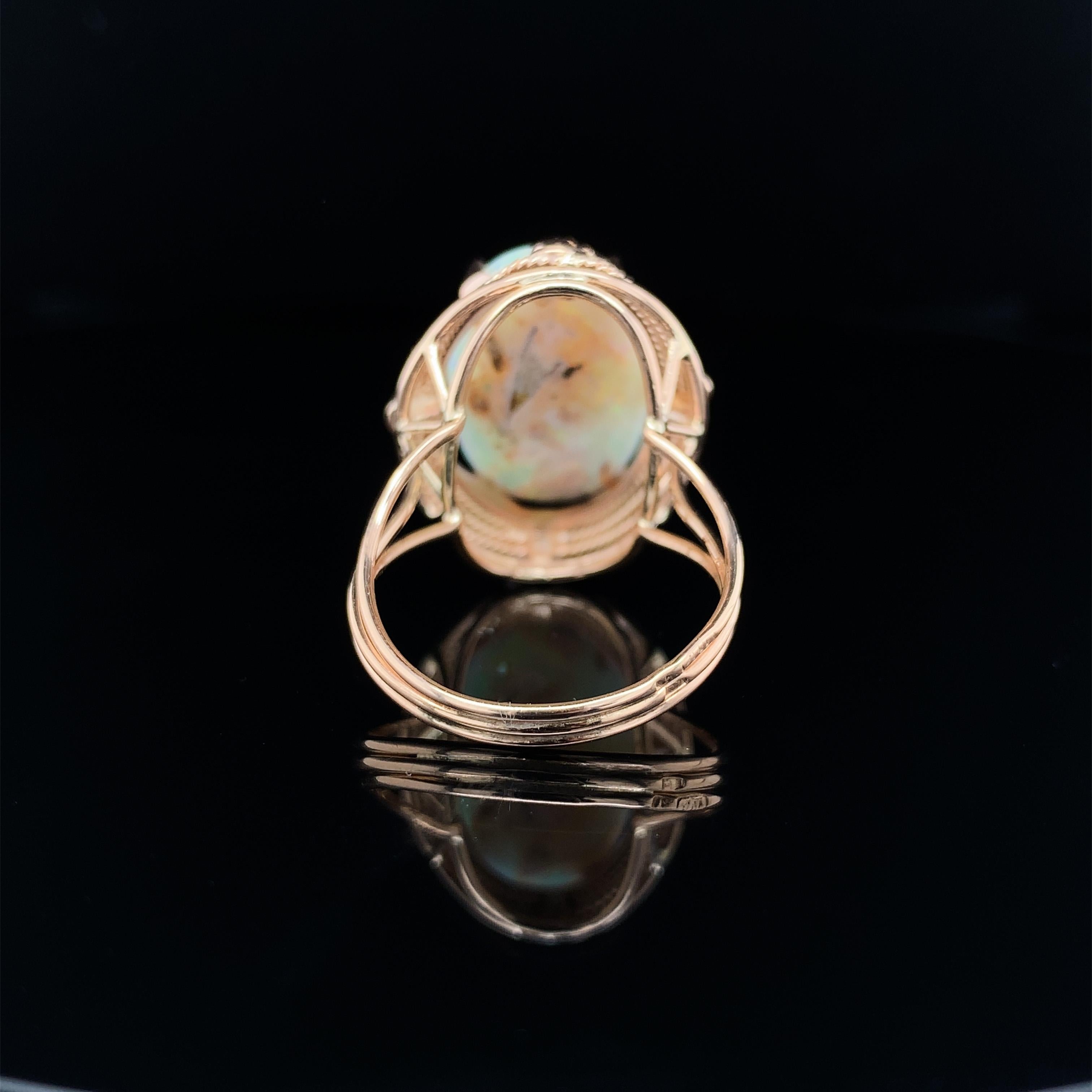 Women's 14K Rose Gold Hand Wrought Ring with a large 6.05 carat Australian Opal For Sale