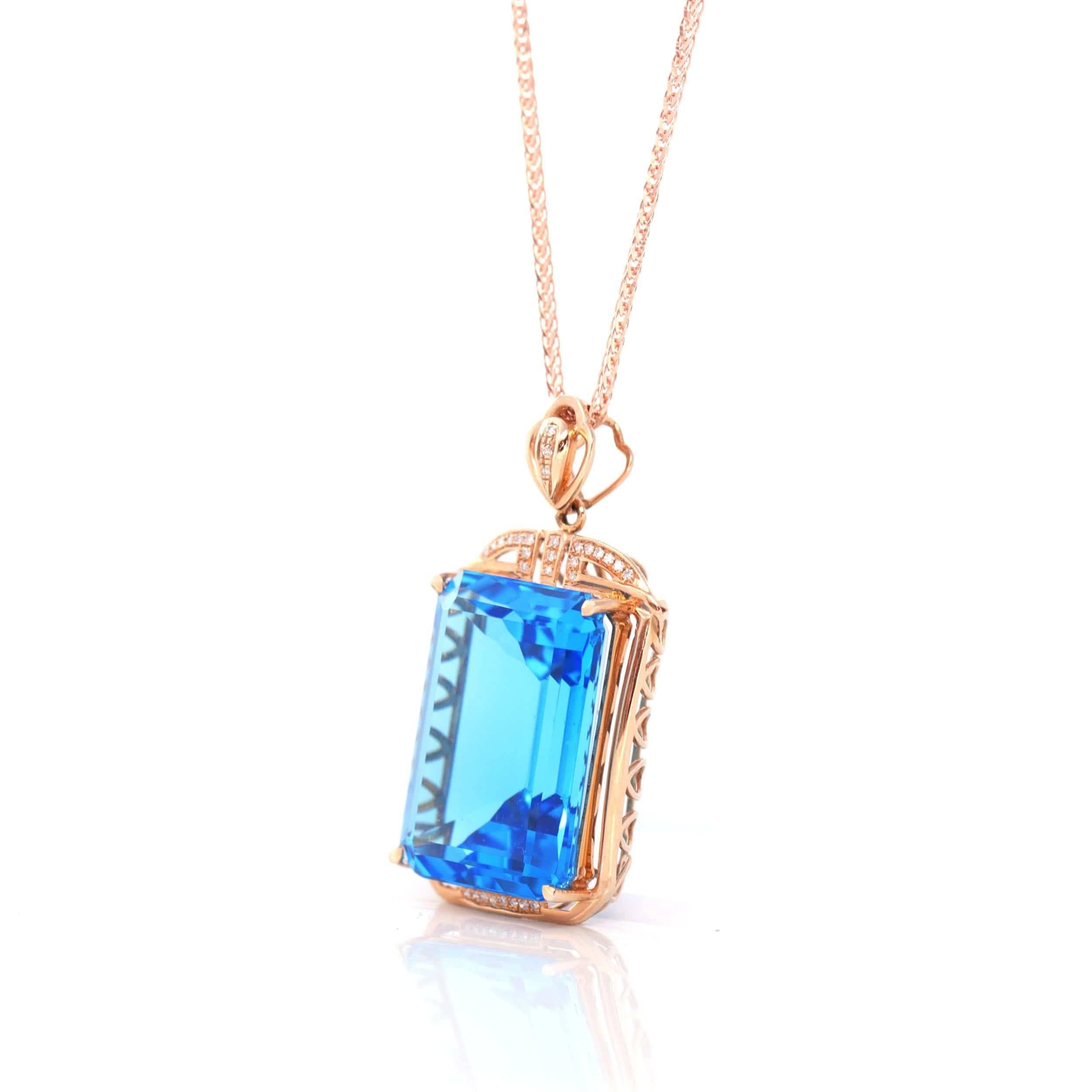 Design Concept--- Part of Baikalla™'s genuine gemstone jewelry collection. This beautiful 27.16ct Swiss Blue Topaz is a nice emerald cut with a simple setting. Even the back is made exquisite with a graceful pattern. It's a perfect gift for you and