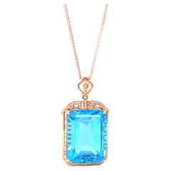 14k Rose Gold London Blue Topaz Emerald Cut Prong Set Necklace with Diamonds