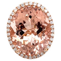 Bague royale en or rose 14 carats avec morganite et halo de diamants