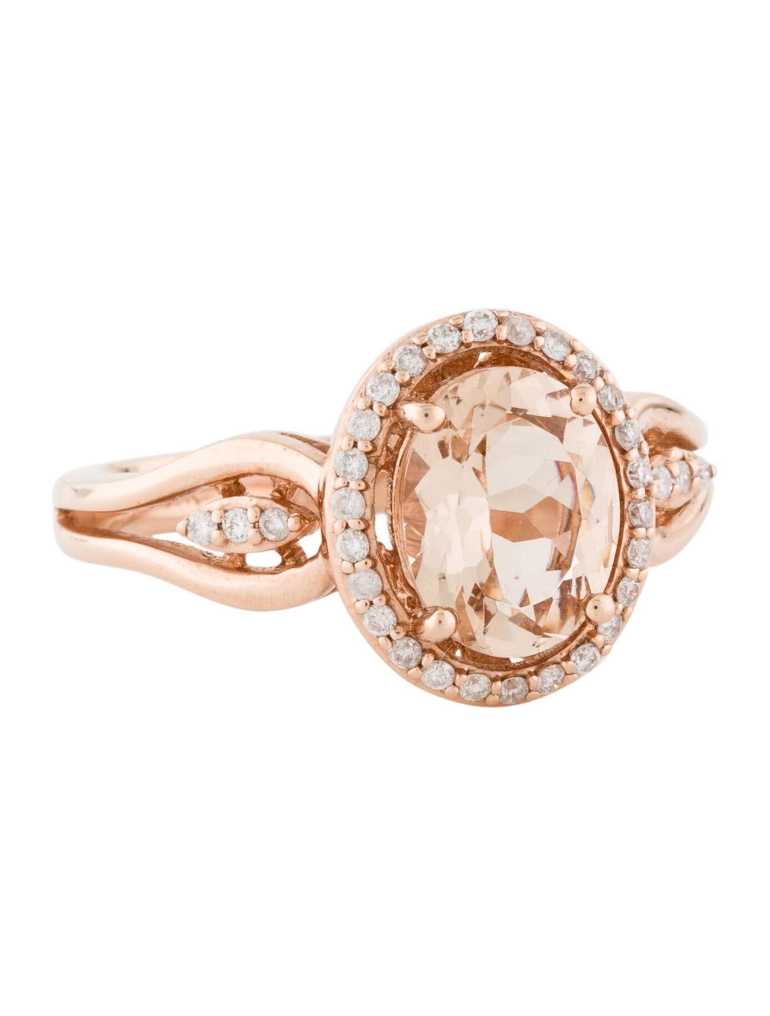 This is an alluring natural morganite and diamond ring set in solid 14K rose gold. The natural oval cut 1.54 Ct morganite has an excellent peachy pink color and is surrounded by Oval cut white diamonds. The ring is stamped 14K and is a true