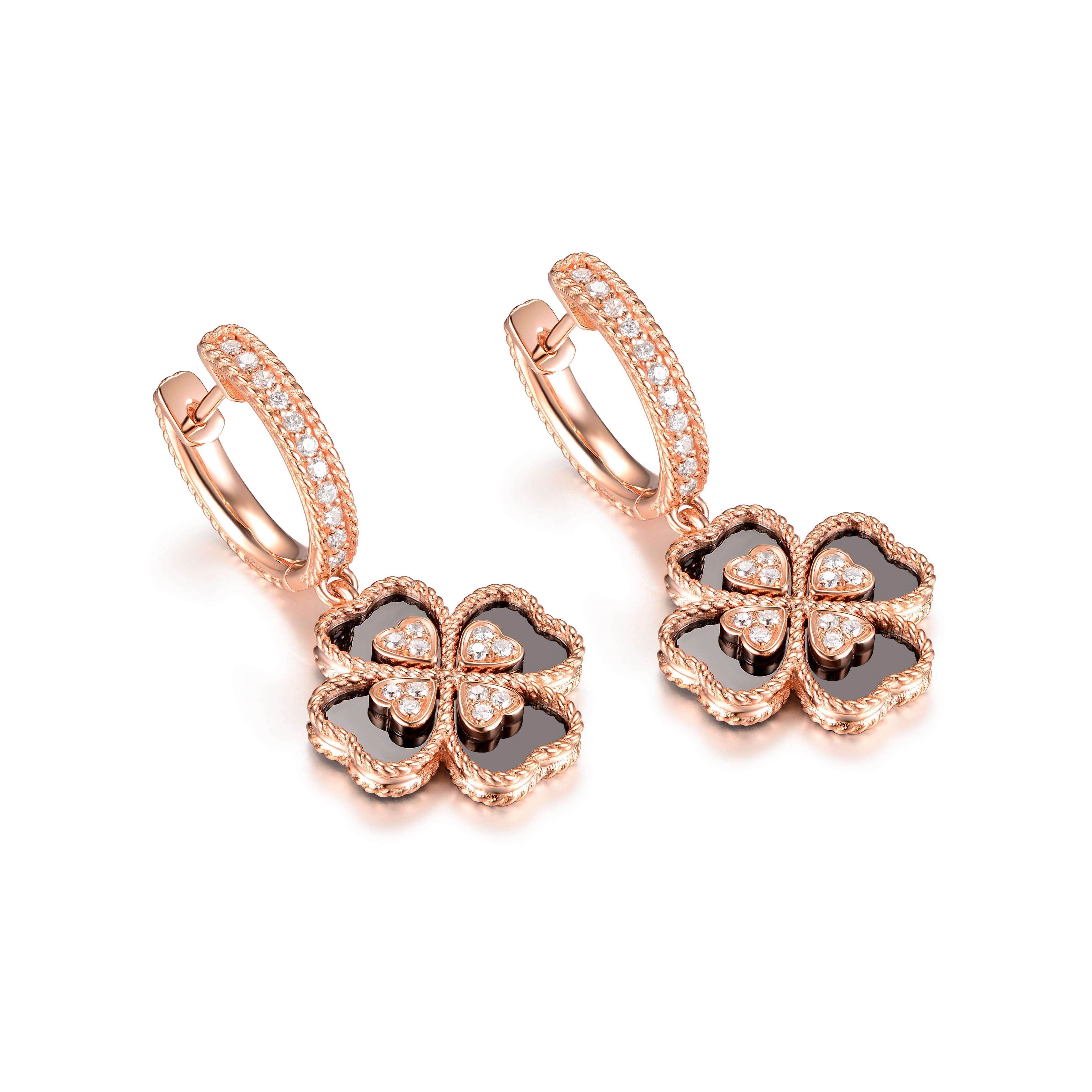 This four leaves clover earring features 0.33 carat of round diamond. Set with 3.05 carat of onyx into 14 karat rose gold. In many culture, it believes clover leaves mean bringing good luck. A simple yet elegant piece for that one you love.

Onyx