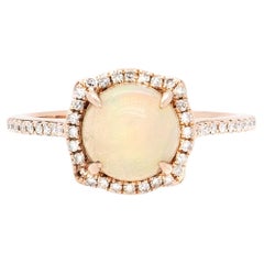 14k Rose Gold Opal Center 0.19ctw Diamond Halo Ring