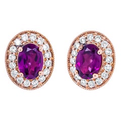14K Rose Gold Oval Cut Garnet and 3/8 Carat Round Diamond Halo Stud Earrings