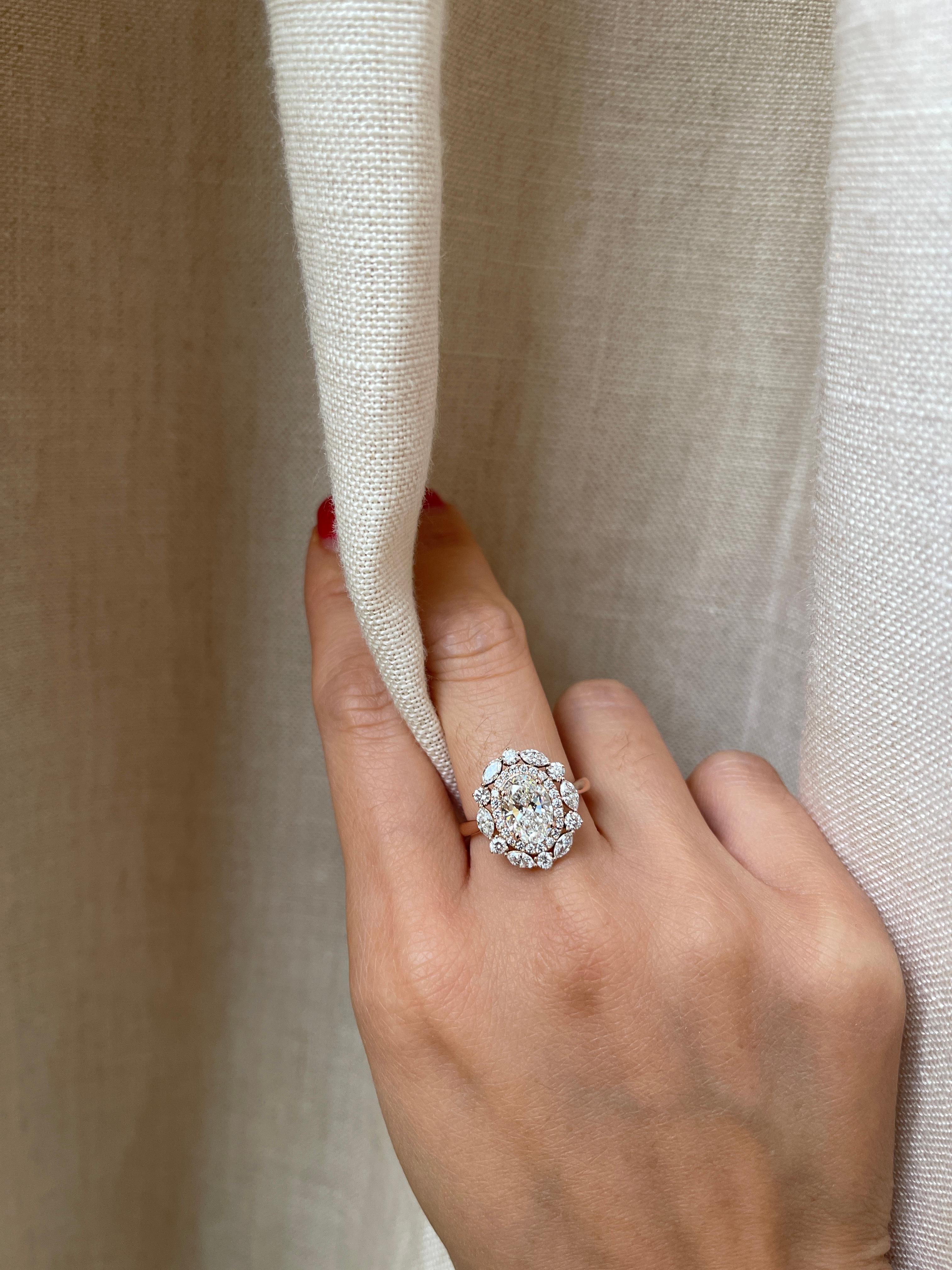 GIA certified natural diamond double halo engagement ring

Metal: 14k rose gold
Main stone: Natural diamond
Main Stone Shape: Oval
Main stone weight: 1.5 carat
Diamond color and clarity: D, I2
Total stone weight: 2.5 carat
Dimension: Approx 2mm band