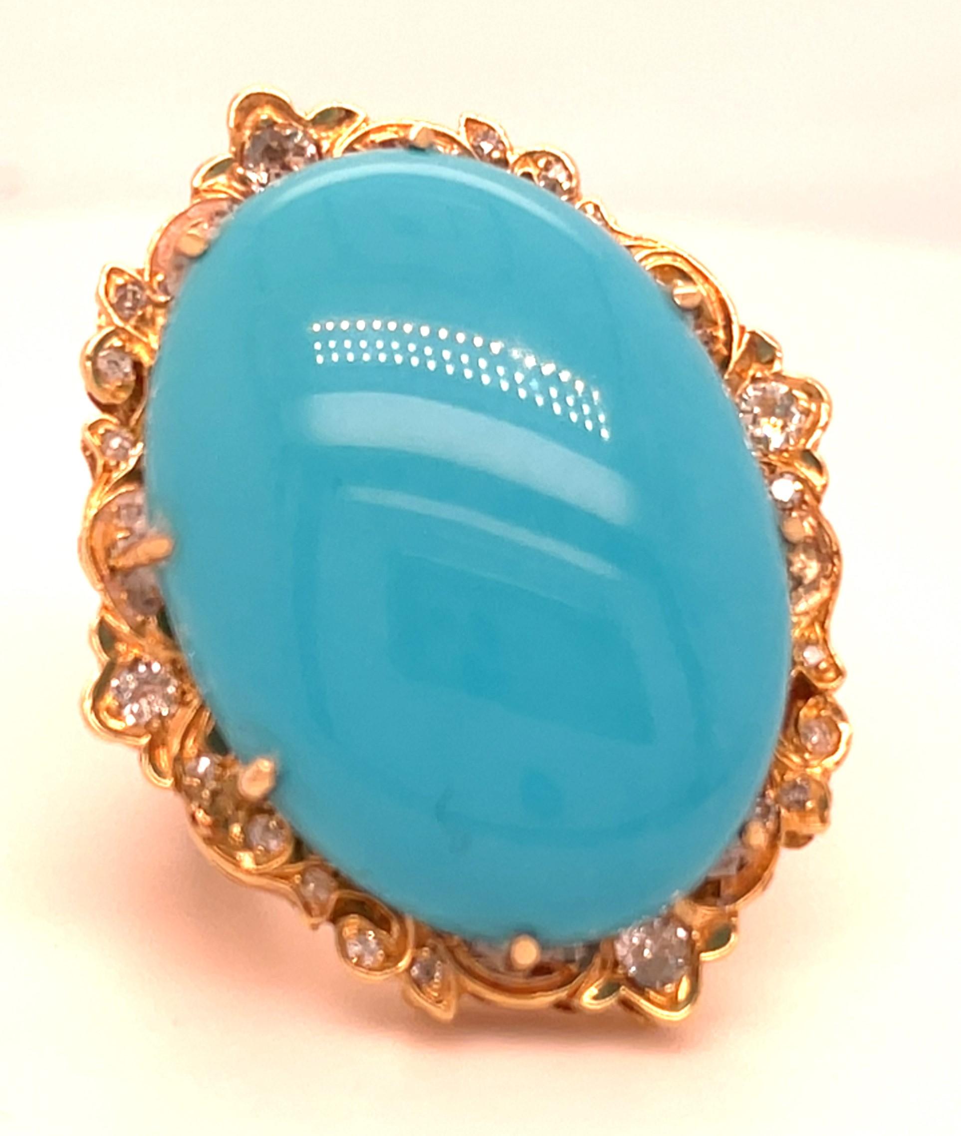Magnifique bague à cabochon en turquoise
Dimensions approx. du cabochon de turquoise = 29 mm x 21 mm
Lunette à diamants complexe
Taille 6.75
Masse totale = 23 gramme
L'anneau est en bon état. Une sorte de résidu blanc (époxy ou liant) autour de la