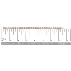 Bracciale da tennis con perline in oro rosa 14K e argento con diamanti da 1/10 di carato