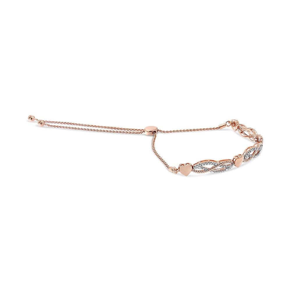 Assuré de créer un look sophistiqué avec n'importe quelle tenue, cet élégant bracelet bolo en diamant est composé d'argent sterling .925 plaqué d'or rose 14k. Il comporte des maillons en forme de cœur en or rose et des maillons à l'infini incrustés