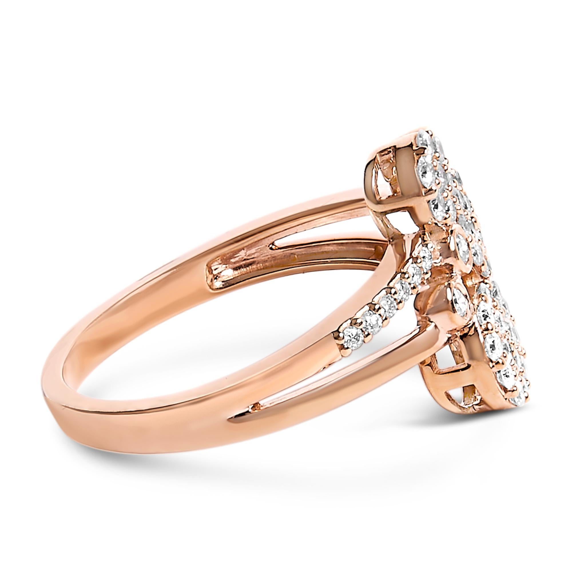 Discover the allure of timeless elegance with this .925 sterling silver bypass ring, artfully accented with a warm 14k rose gold plating that promises enduring shine and wearability. This piece captivates with its clever illusion of three expansive