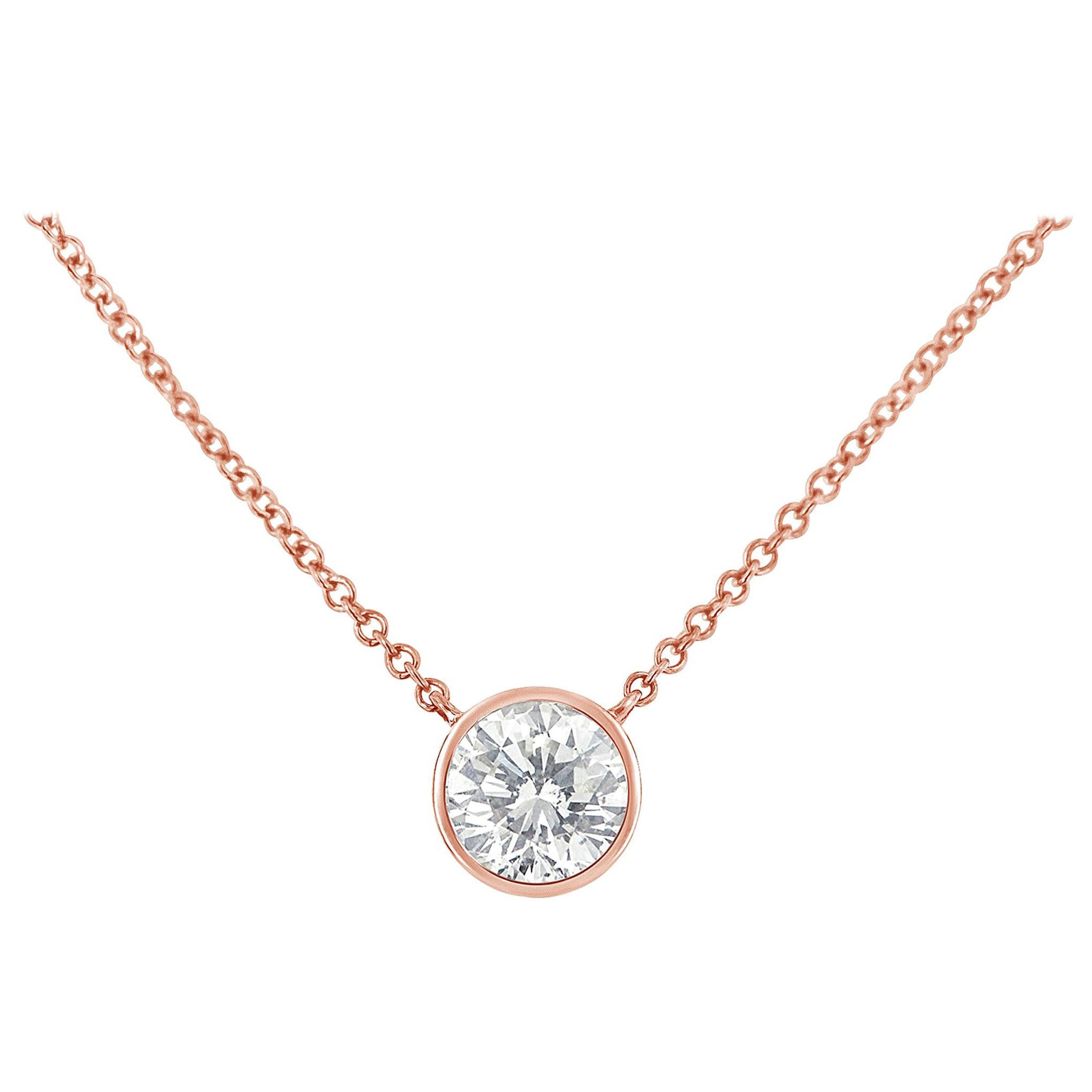 Collier à pendentif solitaire en or rose 14 carats sur argent sterling et diamants de 1/3 carat