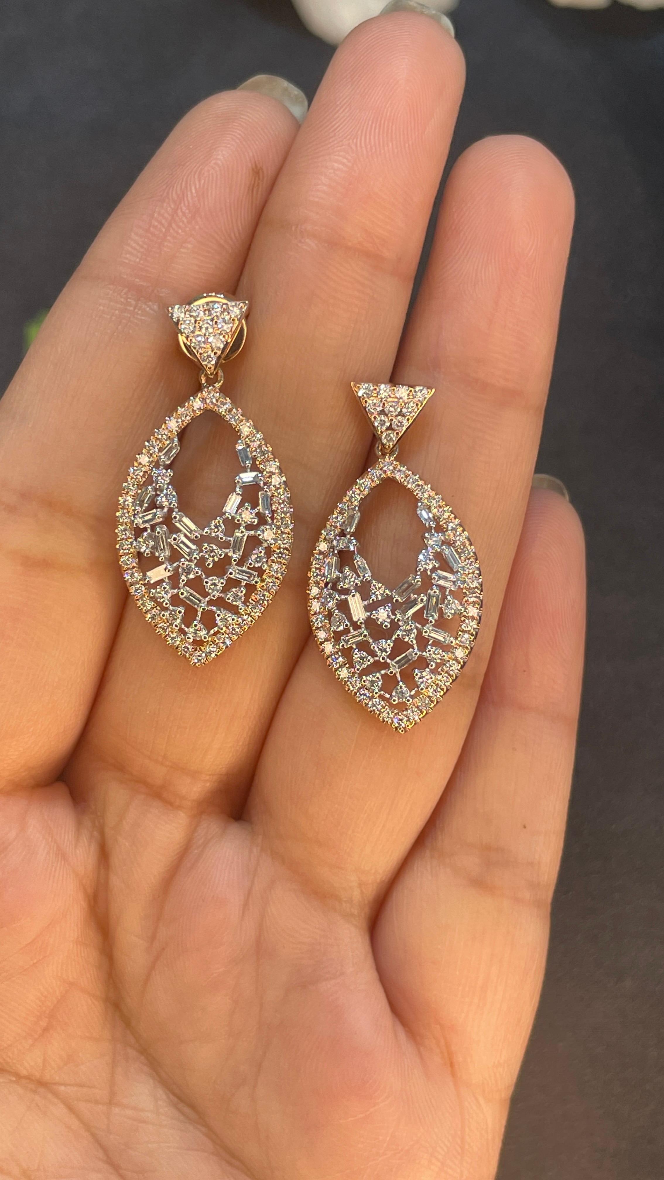 Diamond Fish Dangle Earrings for Women in 14K Gold to make a statement with your look. You shall need dangle earrings to make a statement with your look. These earrings create a sparkling, luxurious look featuring mixed cut diamond.
April birthstone