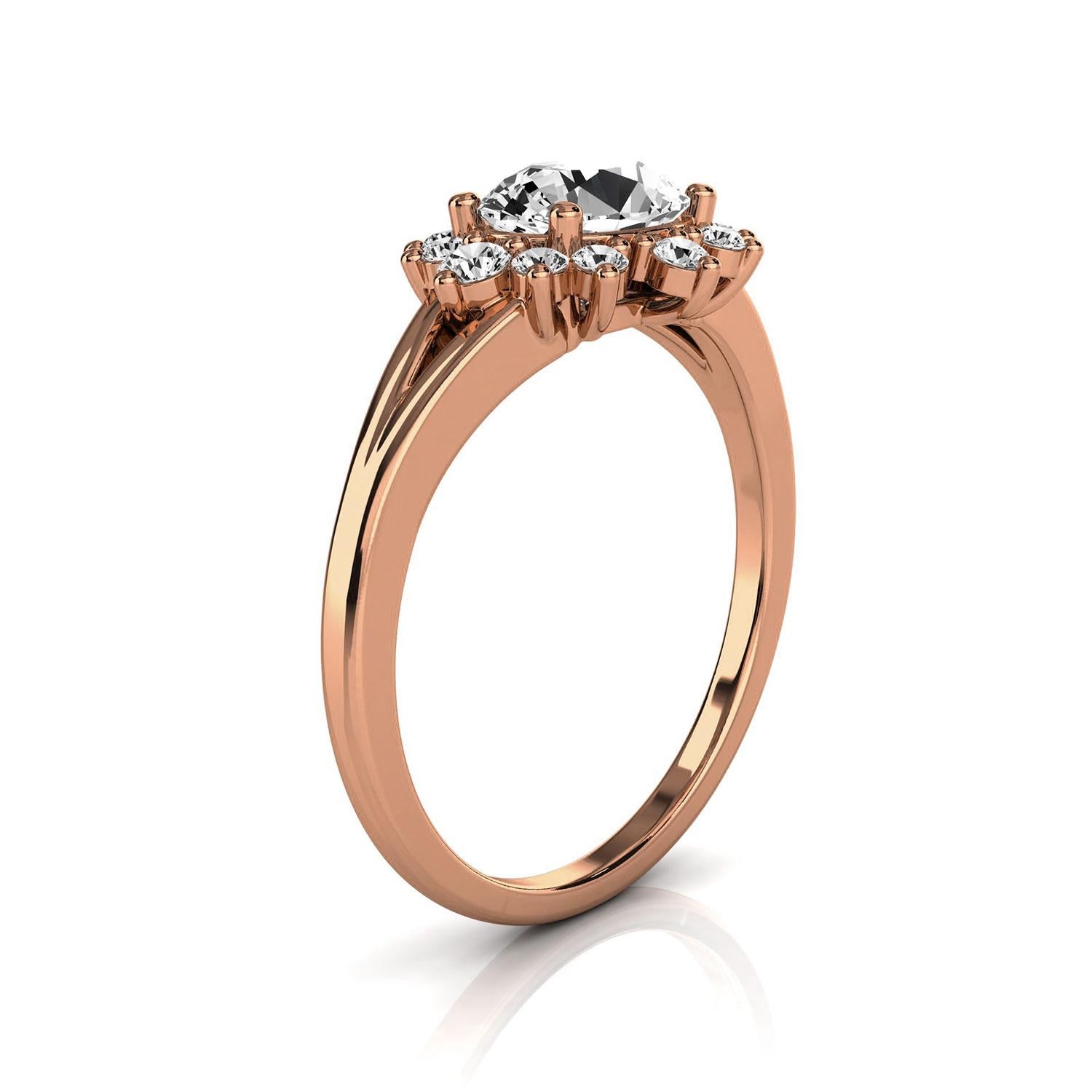 Cette petite bague artisanale au design organique et terreux est dotée de 3/4 de carat  Coussin allongé. Douze (12) diamants ronds créent une grappe florale ajoutant à son style rustique. Découvrez la différence en personne !

Détails du produit :