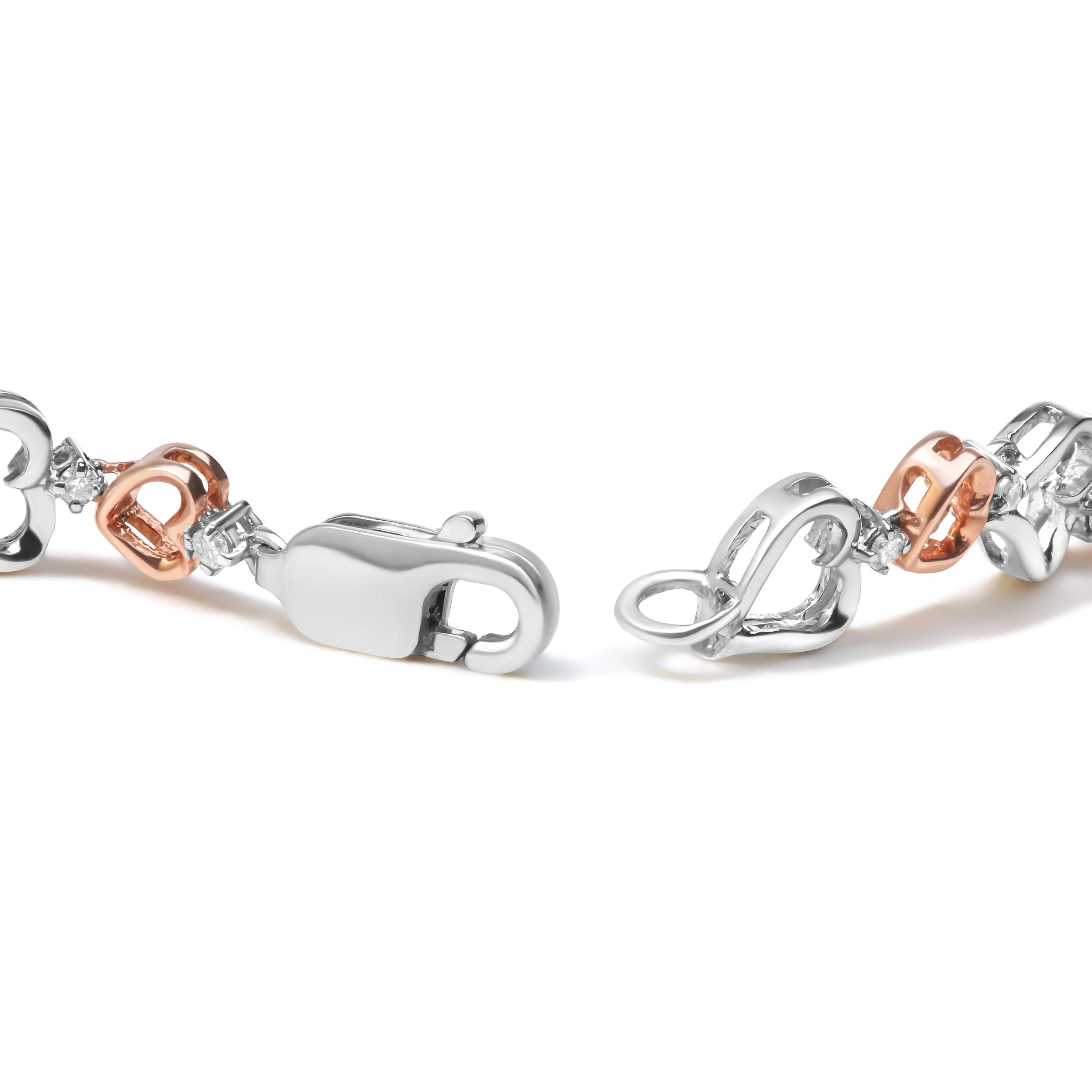 Introducing a stunning and romantic piece of jewelry, perfect for showing your love and affection. This beautiful 14K rose gold plated sterling silver heart link bracelet features 28 natural round cut diamonds, totaling 1/4 carats of radiant