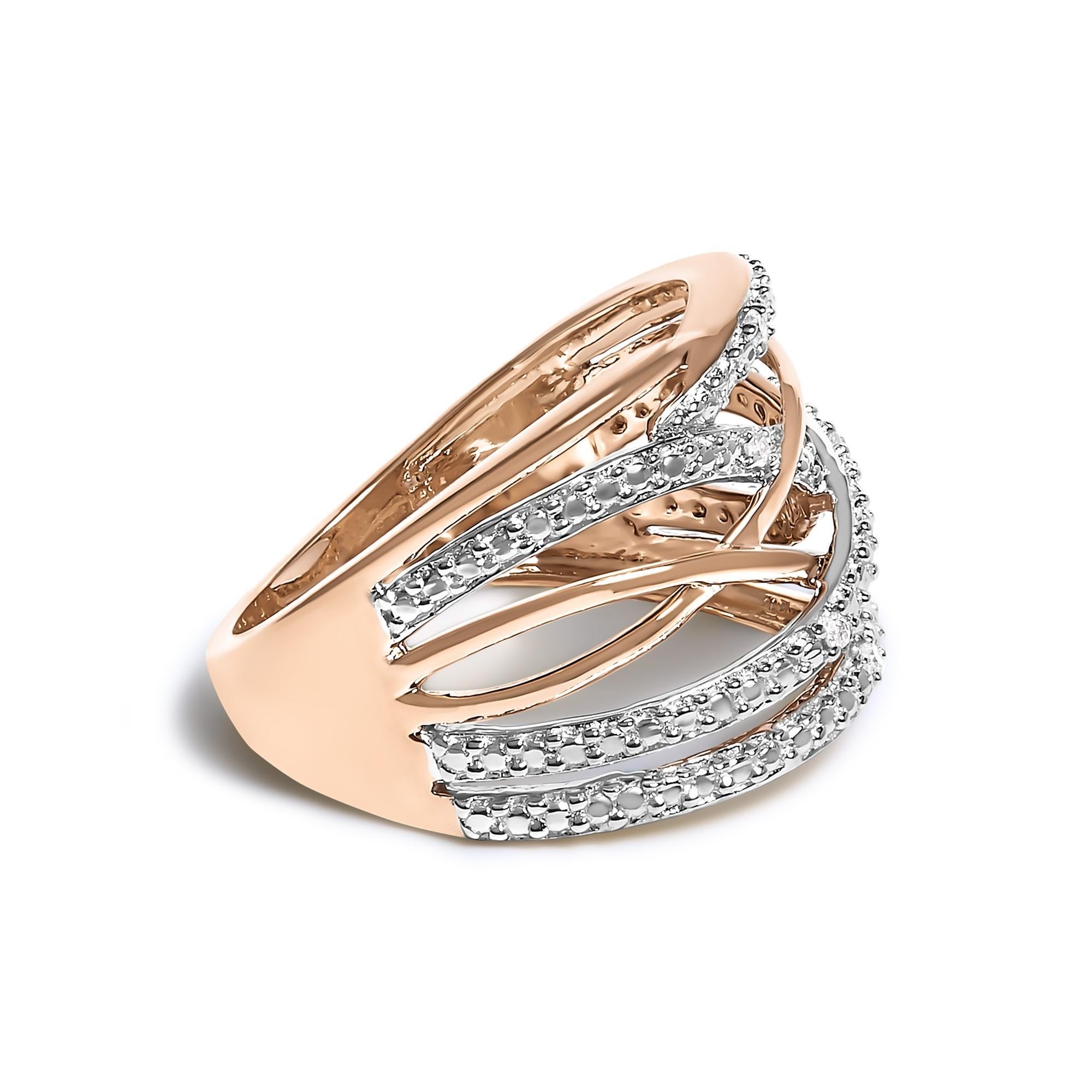 Elegantly woven from .925 sterling silver, this enchanting crossover ring is 14K Rose Gold plated to give the ring its warm, pink glow. The masterpiece intertwines multiple bands in a captivating dance, conjuring images of eternal, intertwining