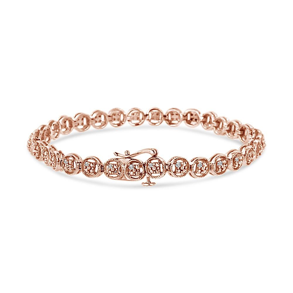 Grace your wrist with the timeless allure of our 14K Rose Gold-Plated Sterling Silver Tennis Bracelet. Adorned with 17 natural diamonds, the embodiment of elegance, it delicately combines baguette and princess-cut stones. Each diamond, with I-J