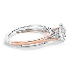 Anello in argento sterling placcato oro rosa 14K con diamanti per un totale di 1/10 Cttw e motivo a cuore