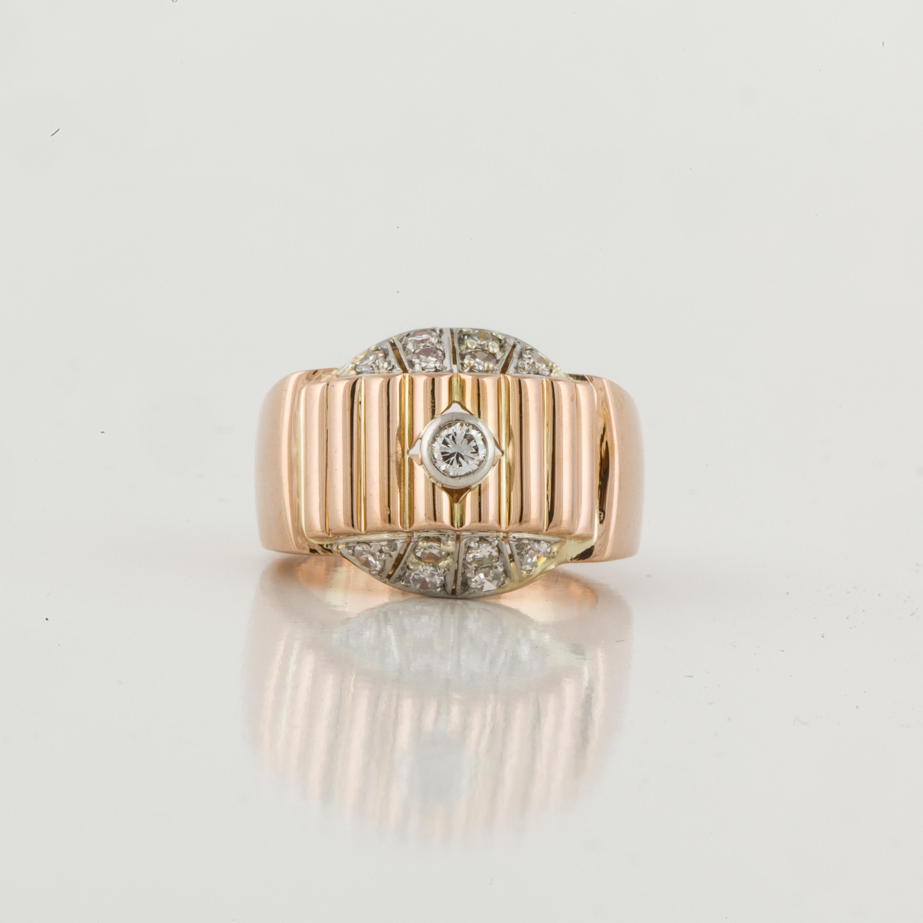 14K rose gold ring with 13 round diamonds in a stair step design.  The diamonds total 0.45 carats; H-I color and VS2-SI1 clarity.  Measures 3/4 inches long, 5/8 inches wide and stands 1/2 inch off the finger.