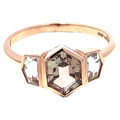 14K Rose Gold Ring with Oregon Center Sunstone 
Moonstones