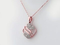 Halskette mit rundem, durchbrochenem Wirbel-Anhänger aus 14-karätigem Roségold mit Diamanten