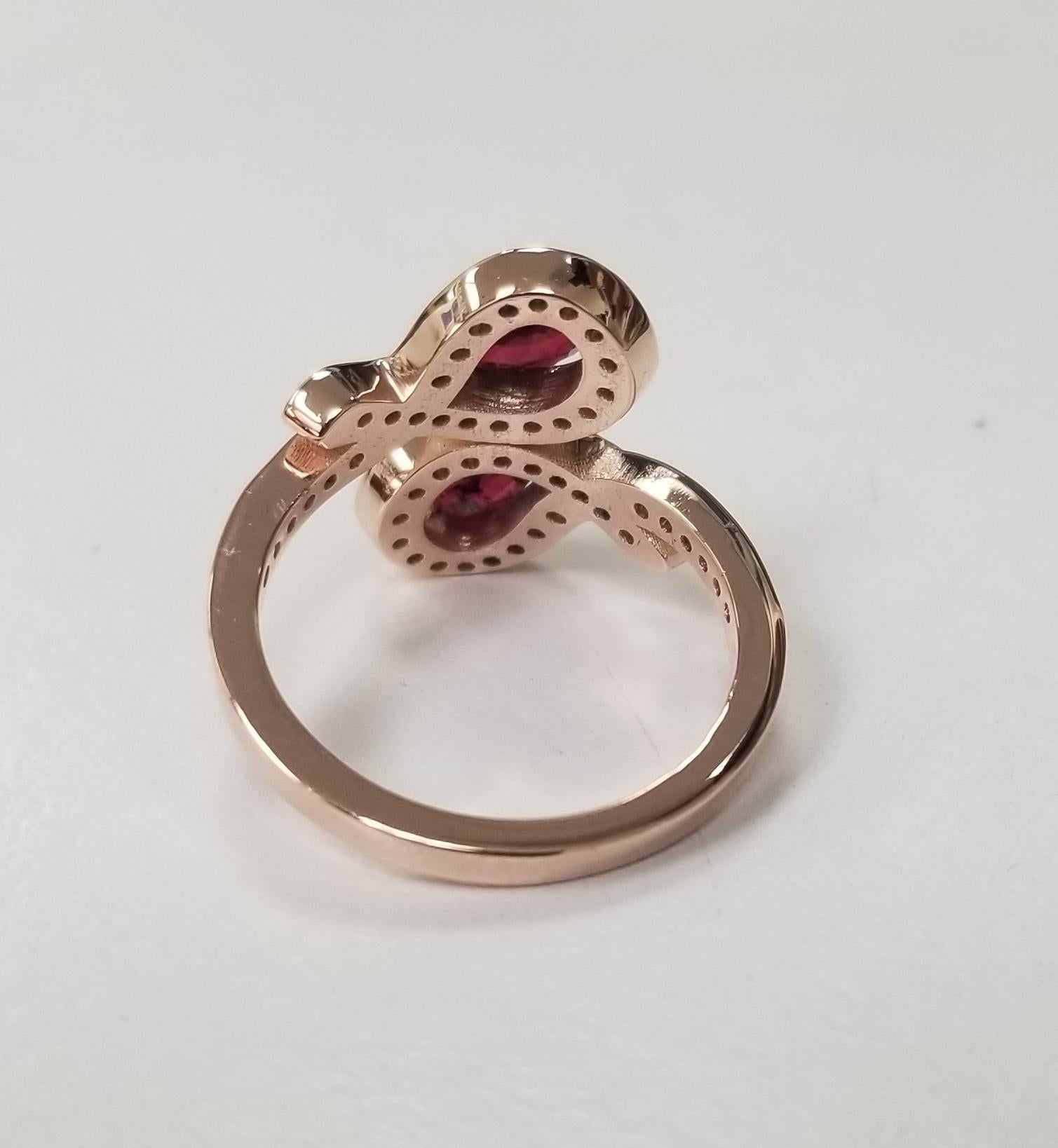 Contemporary 14 Karat Rose Gold Ruby and Diamond Ring