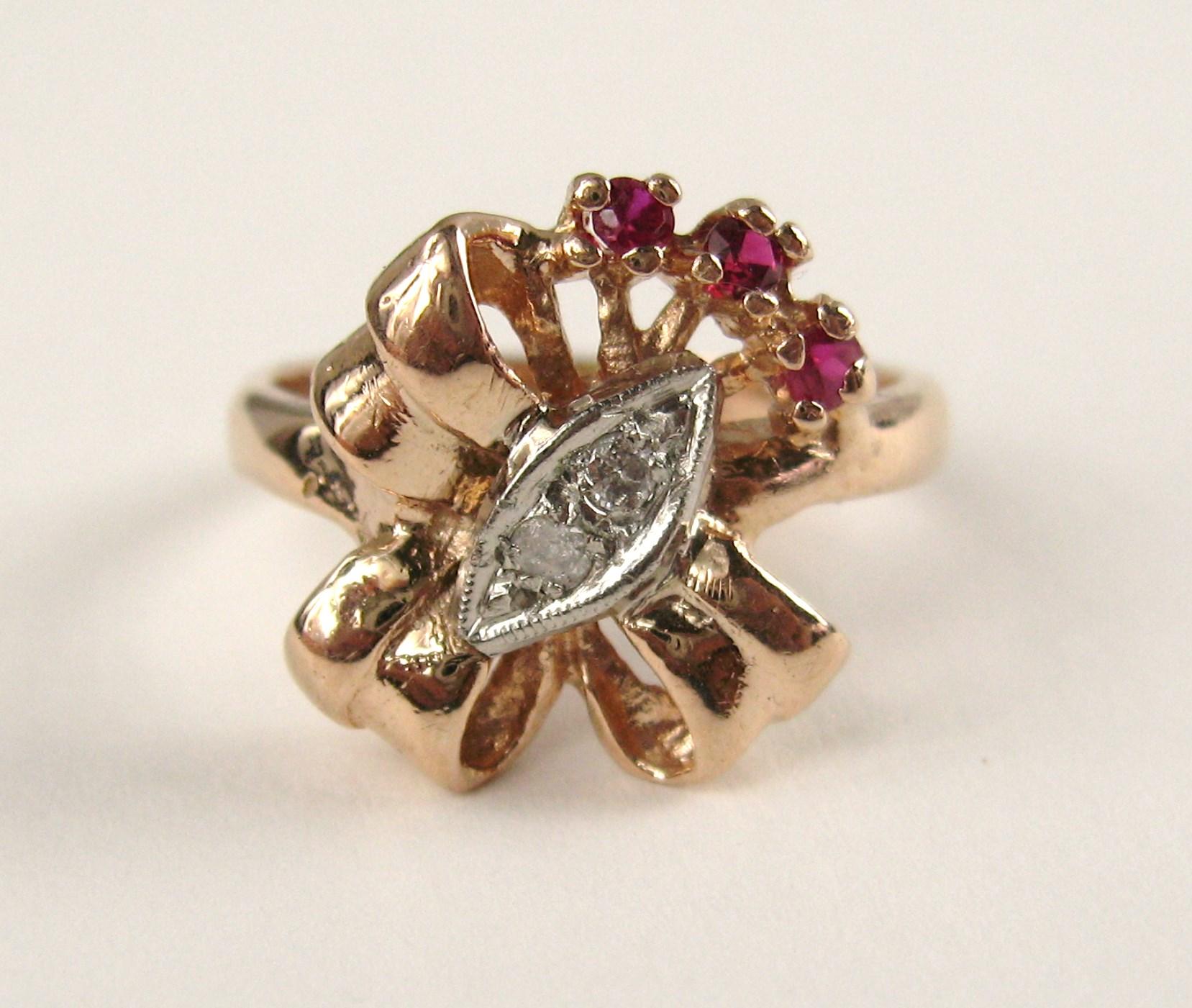 Art Deco 14 Karat Rose Gold Ruby and Diamond Bow Cocktail Ring, 1940s For Sale