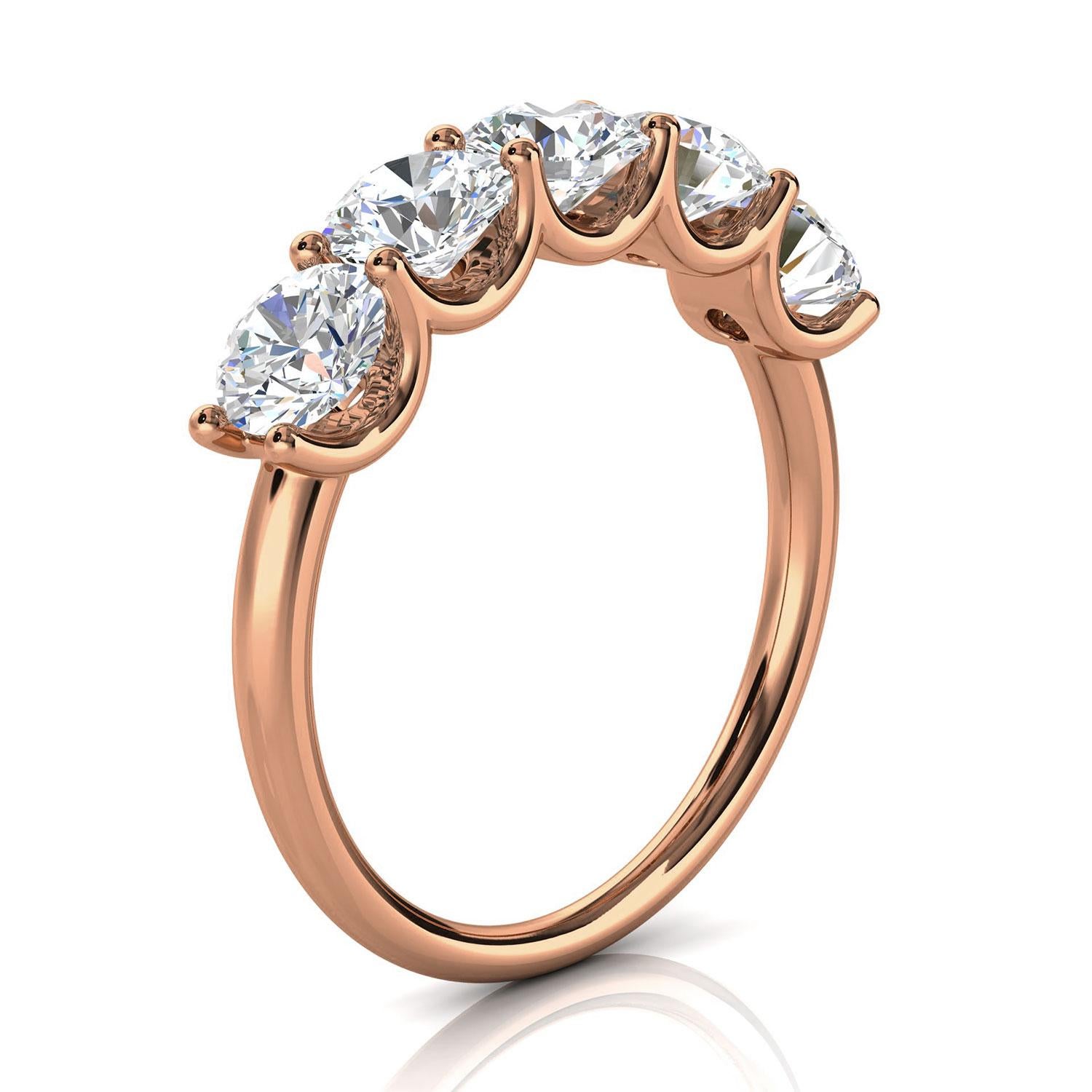 This ring features five(5) floating Brilliante round diamonds set in 