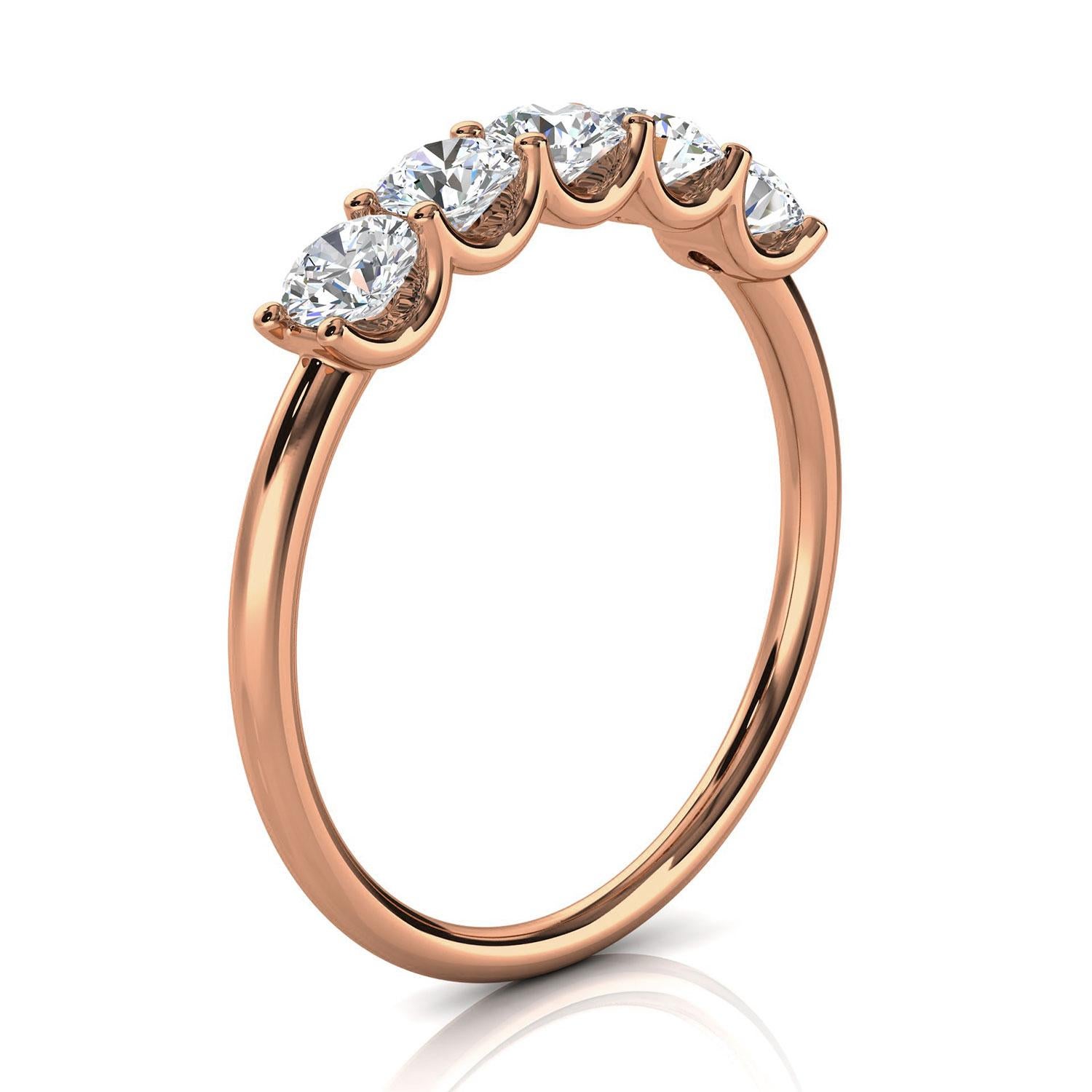 This ring features five(5) floating Brilliante round diamonds set in 