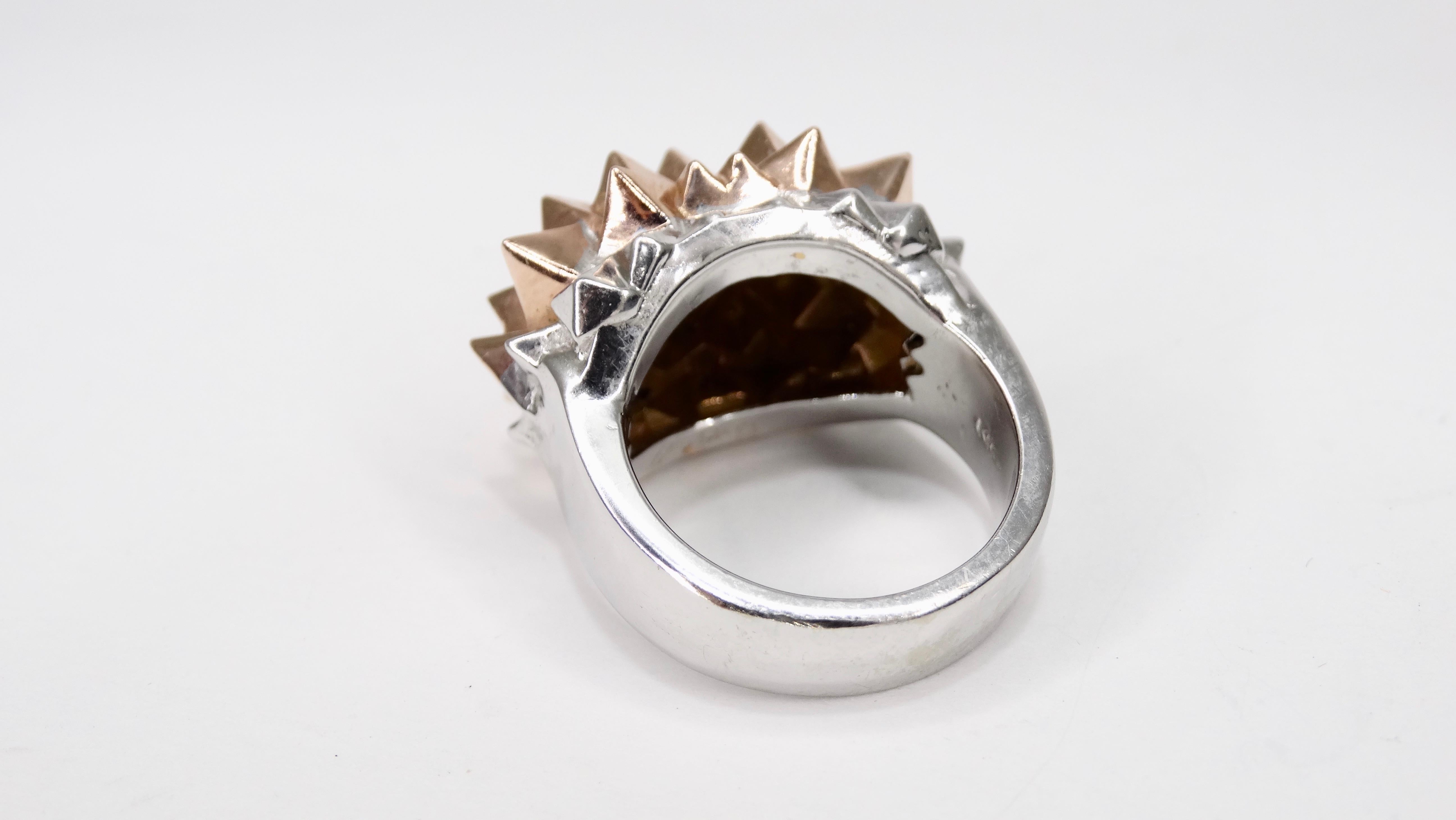 Make a statement with this custom made cocktail ring! Circa 21st century, this dome ring is crafted from 14k rose gold and features a silver dipped band with spikes. Stamped 14k, is a size 9 and weighs 28.45g. Hard to miss, this statement cocktail